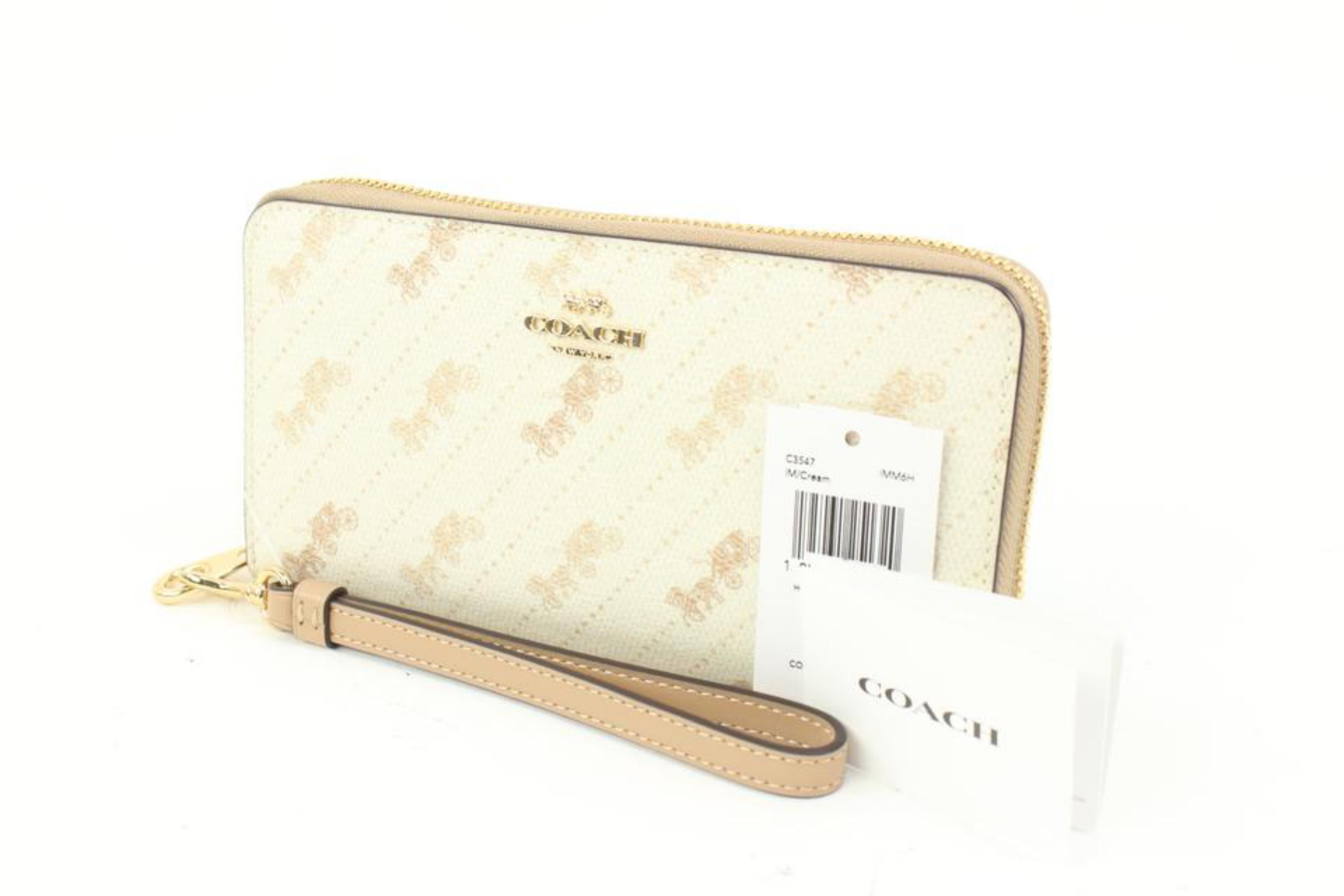 Coach FC3547 C3547 Cream Horse and Carriage Dot Print Long Zip Around 1co419
Date Code/Serial Number: B2180 C3557
Made In: Vietnam
Measurements: Length:  7.5