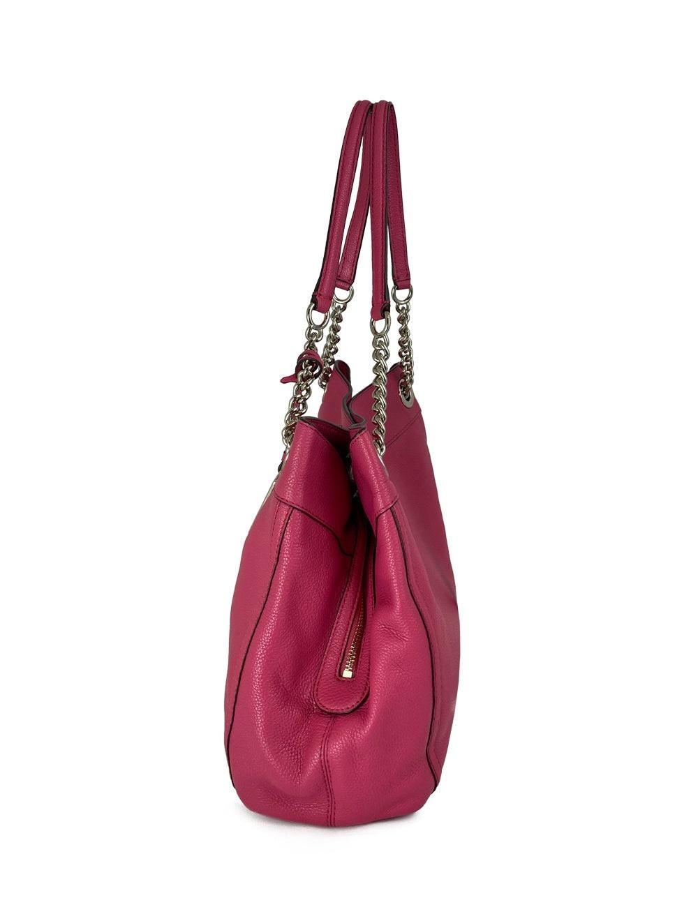 Fuchsia Coach handbag with two zipper pockets and two slide pockets on the inside. In excellent condition.

Additional information:
Material: Leather
Hardware: Silver
Measurements: 36 W x 17 D x 27 H cm
Handle Drop: 24 cm
Overall condition: Very