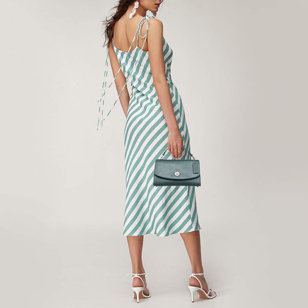 Designer bags are ideal companions for ample occasions Here we have a fashion meets functionality piece crafted with precision. It has been equipped with a well sized interior that can easily fit all your essentials.