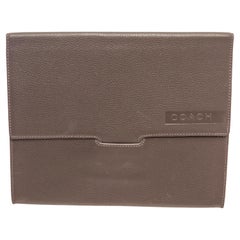 Coach grey pebbled leather tablet sleeve, embossed logo at front, black logo 