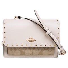 Coach - Sac à bandoulière Klare en cuir et toile enduite beige clair avec sangle Rivets