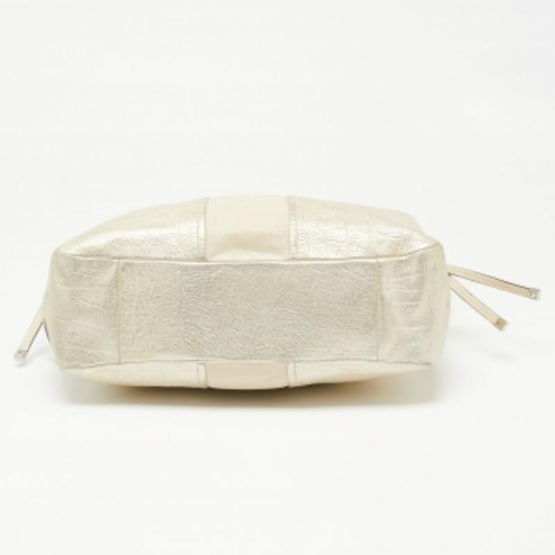 Bolso bandolera Coach de cuero dorado claro con cordón lateral en venta 2