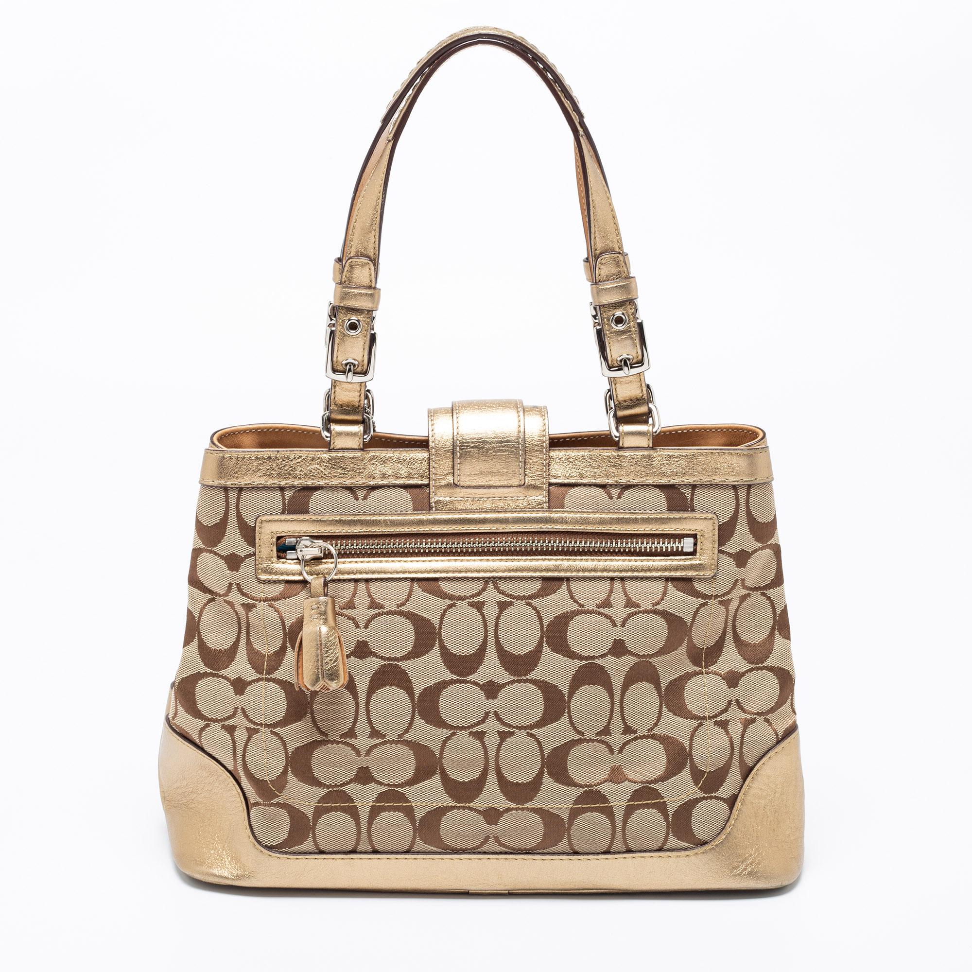 This stylish tote comes from the House of Coach. It is crafted from metallic-gold and silver Signature canvas and leather and is decorated with silver-toned hardware. It features two handles and a fabric-lined interior. This creation is ideal for