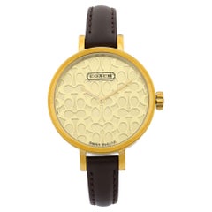 Coach Miranda Montre pour femme avec cadran caractéristique en acier et cuir de couleur or 14501068