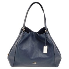 Coach - Sac à bandoulière Edie en cuir bleu marine