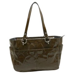 Bolso Coach verde oliva Op Art en charol estampado East West Gallery Tote