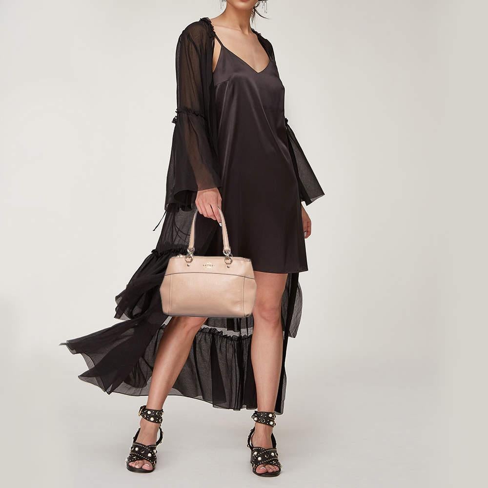 This satchel is built to hold your essentials in the most fashionable way Easy to style  well made using best materials  and coming from the top brand  the satchel will add immense style to your ensemble.