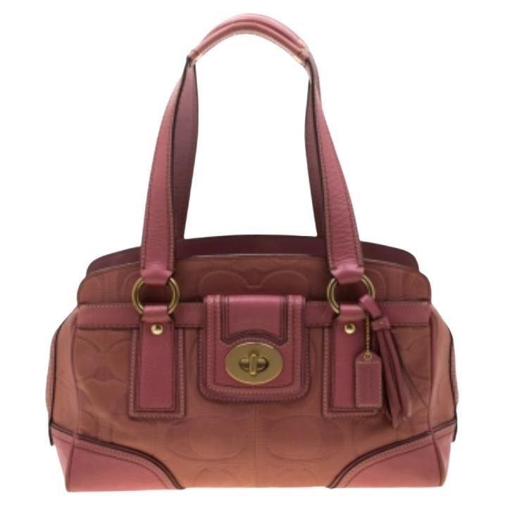 Coach - Cartable à pochettes en cuir rose avec fermeture à clé