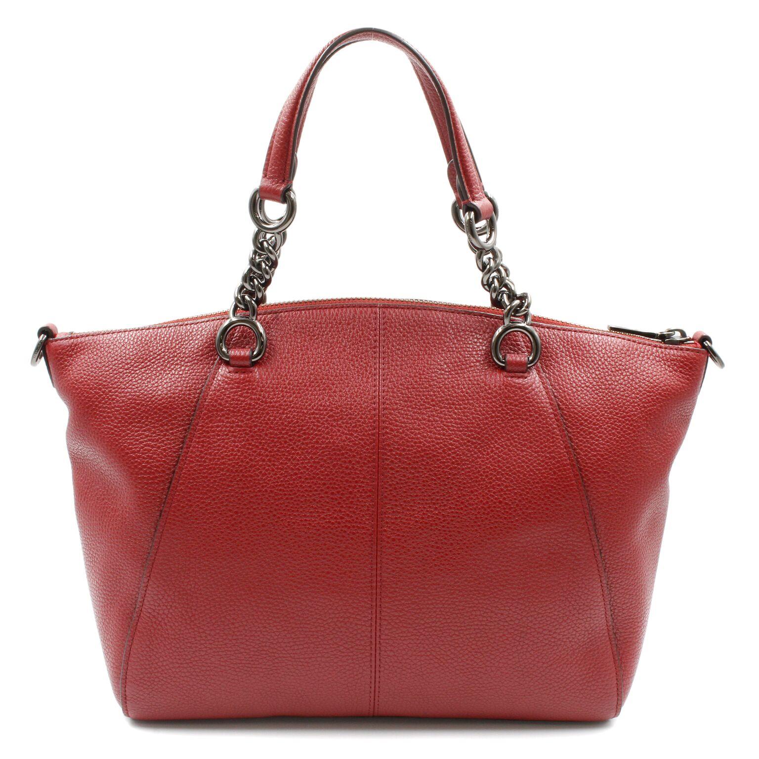 Coach Prairie Satchel Burgundy Women's Handbag 59501. Crafted in soft, lightweight pebbled leather with a bit of sheen. Very refined hardware complements the minimalist design, the slender strap detaches for multiple wearing options. 
Details: