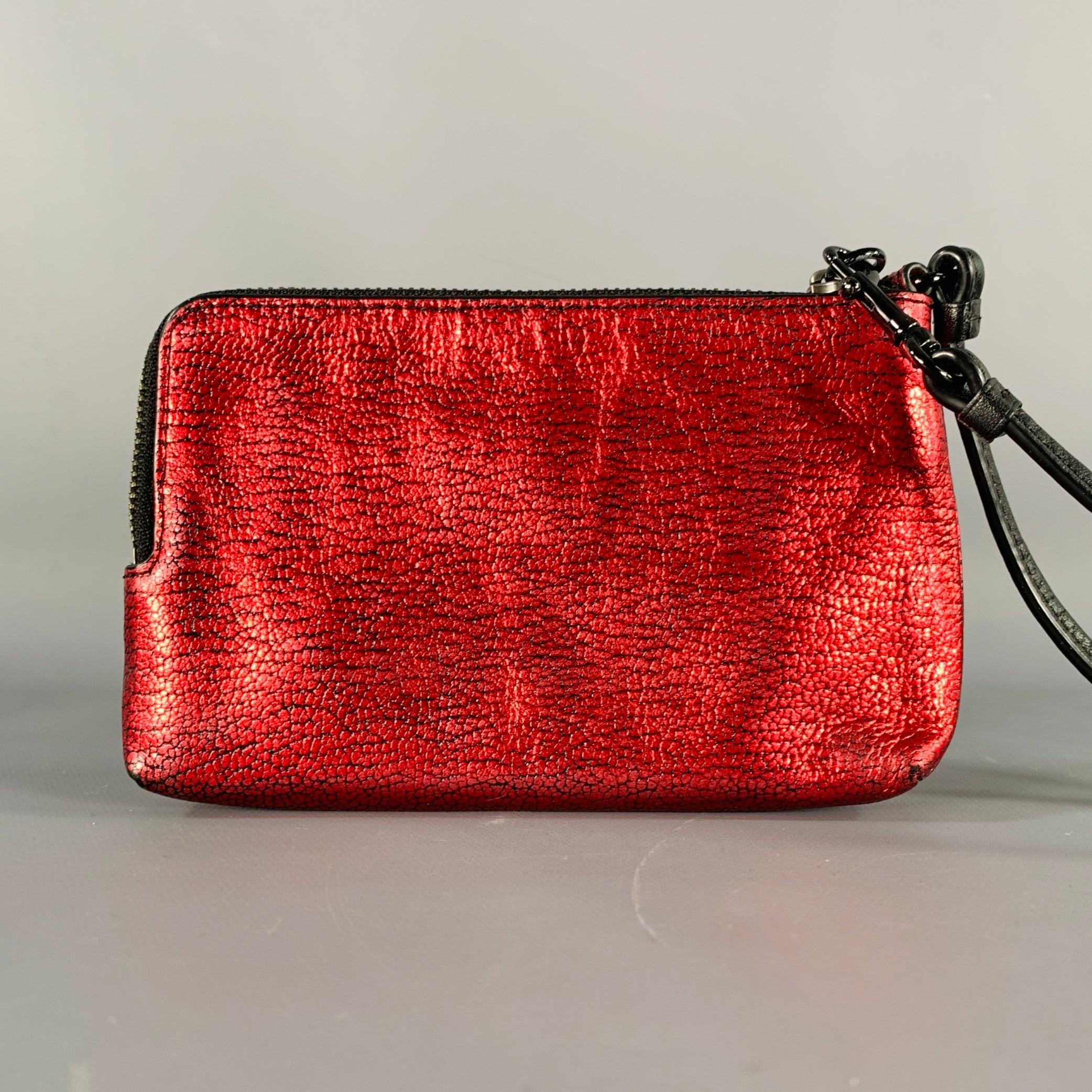 COACH wallet
in a red fabric (feels like leather) featuring a wristlet style with black strap, two compartments, and zip closure.Very Good Pre-Owned Condition. Signs of wear on corners, as is. 

Marked:   G1480 524296 x 3.5 inches 
  
  
 
Sui