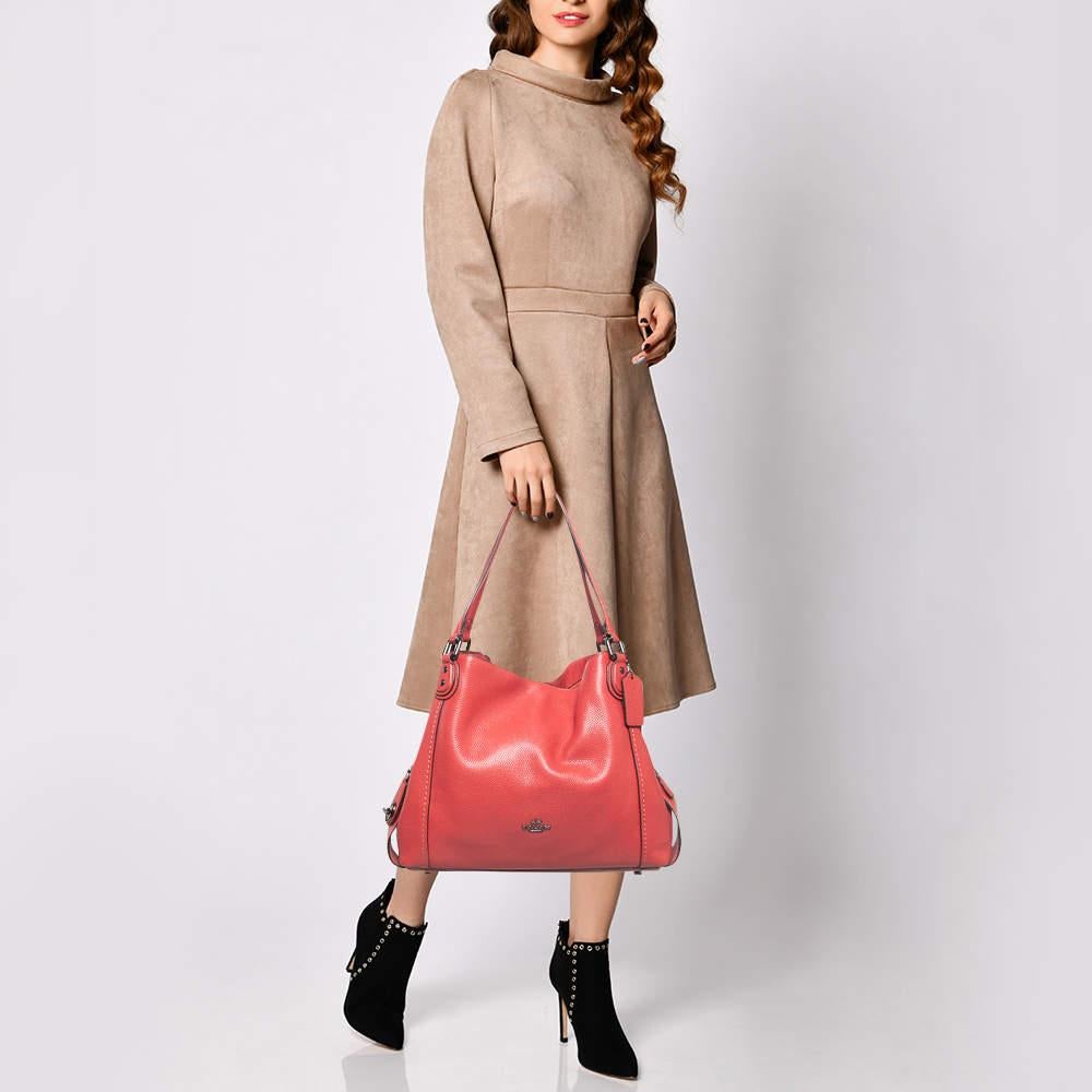 If you are looking for something that reflects chic and luxury then this bag is a fine choice. Crafted from premium materials it can be conveniently carried around and its interior is spaciously sized to house your belongings with ease.