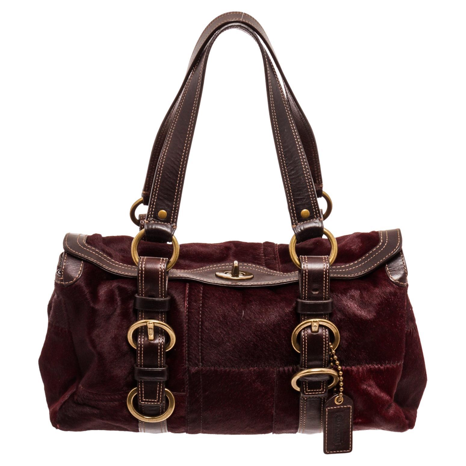 Coach red limited edition pony hair turnlock satchel with gold-tone hardware
