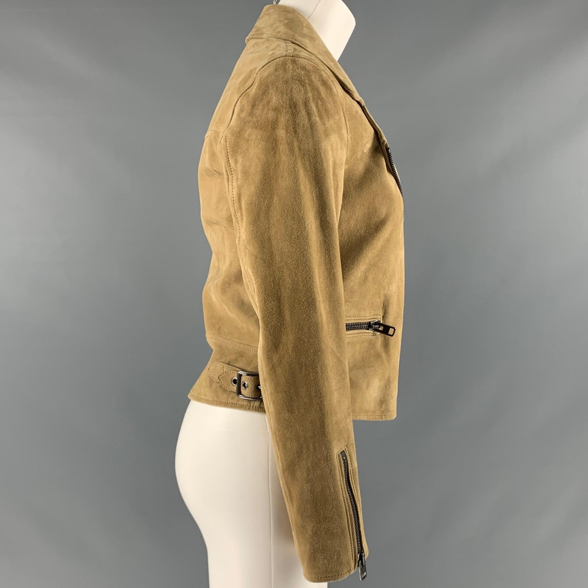 COACH jacket
in a tan lamb skin suede fabric featuring a biker style, zipper pockets, and a zip up closure.Excellent Pre-Owned Condition. 

Marked:   Size tag removed. 

Measurements: 
 
Shoulder: 15.5 inches Bust: 34 inches Sleeve: 23 inches