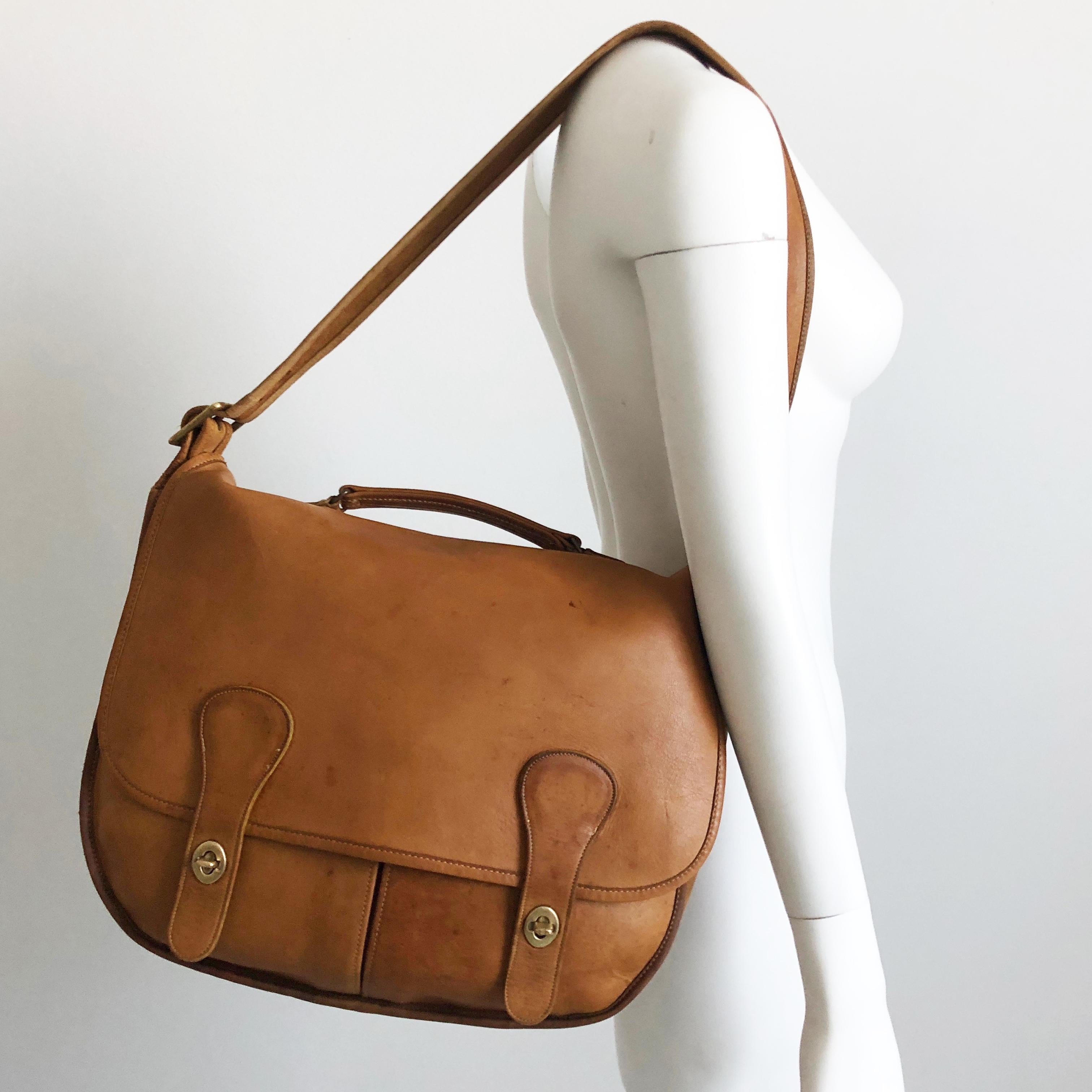 Authentic, preowned, vintage (and rare!) 60s Coach Bonnie Cashin 'Swag Bag' large leather messenger bag.  Made in NYC & extremely hard to find, especially in this condition! Made from incredible saddle leather, with top handle & adjustable/removable