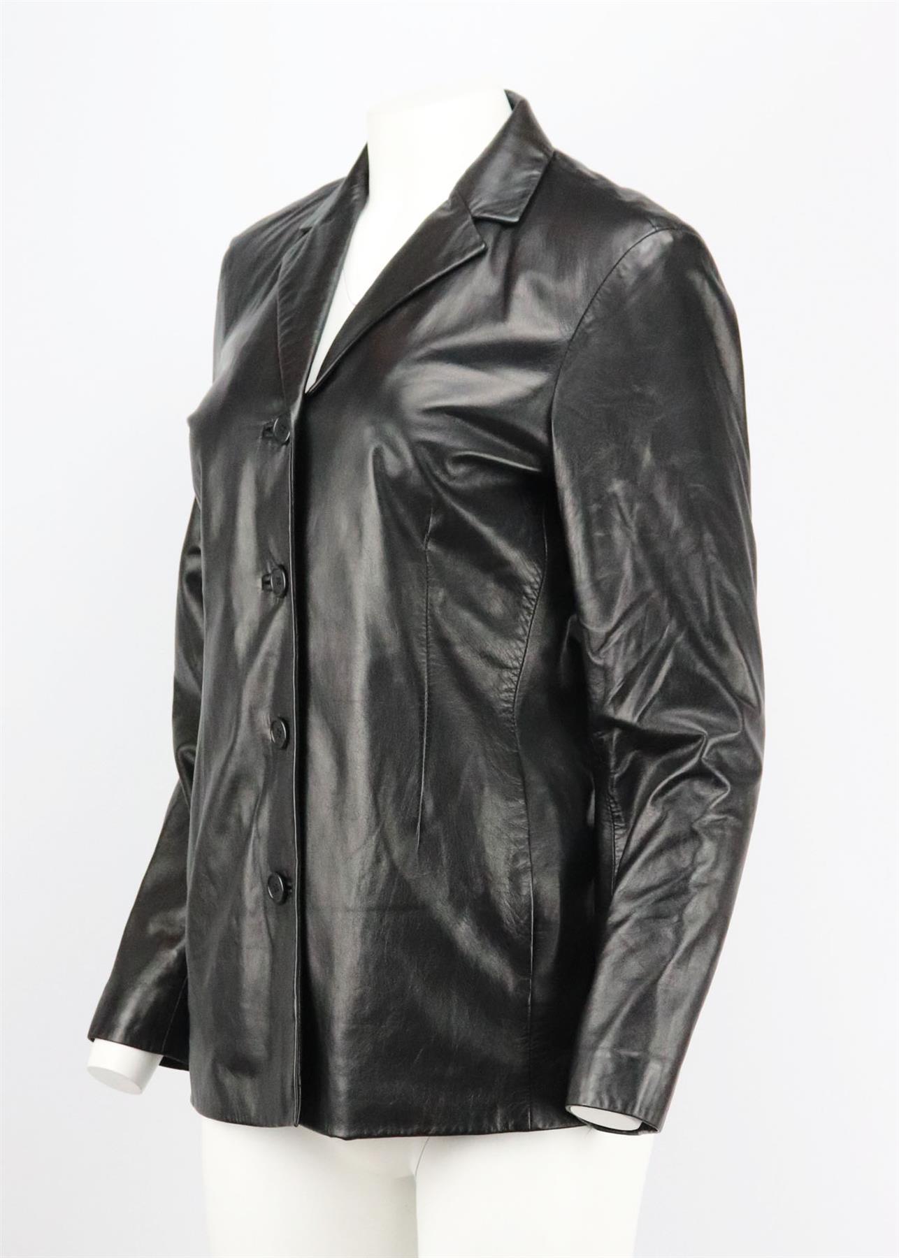 This vintage blazer by Coach is made from faux that's soft and supple, it's cut for a slightly loose fit and has a full lining. Black leather. Button fastening at front. 100% Leather; lining: 100% polyester. Size: Medium (UK 10, US 6, FR 38, IT 42).