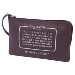 Bolso tipo riñonera Coach Wrislet de piel burdeos