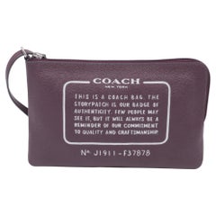 Bolso tipo riñonera Coach Wrislet de piel burdeos