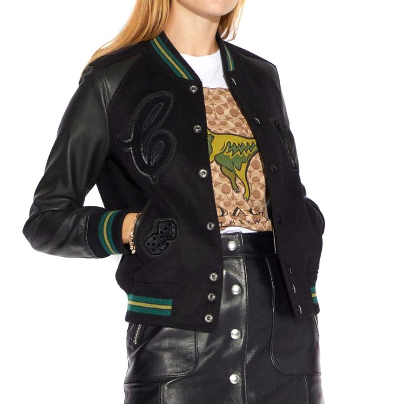 Coach x The Viper Room varsity jacket

- This jacket is from a special collaboration between Coach and the iconic L.A. nightclub The Viper Room.
- Black, wool-blend felt 
-  Round neck, long leather sleeves 
- Badge motif front applique 
- Back 'The
