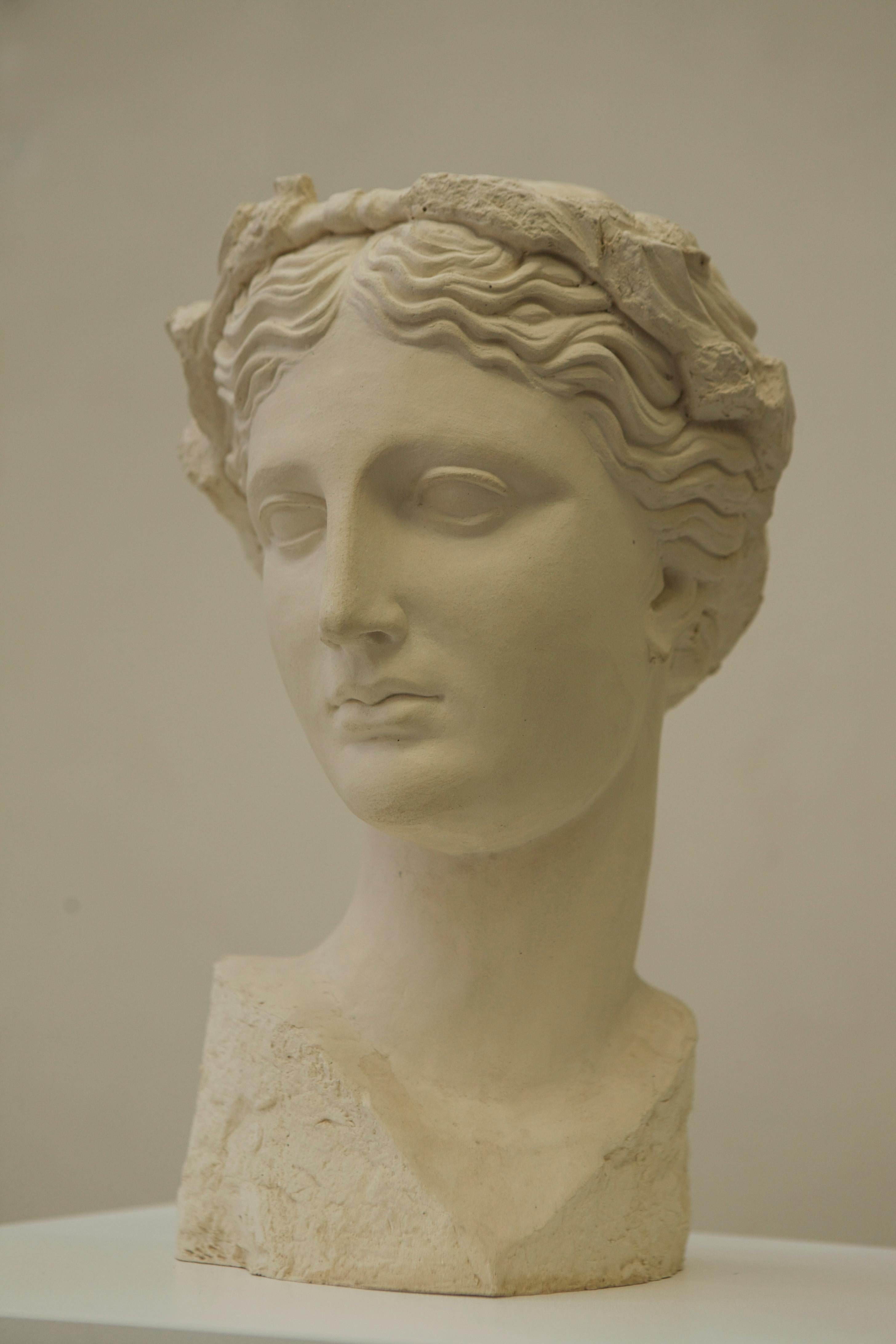 Thalia, one of the Three Graces, frequently appears alongside her sisters in Neoclassical sculptures. She is known to symbolize youth and beauty.

The Coade Head of Thalia draws inspiration from a 2nd-century Roman bust that bears resemblance to