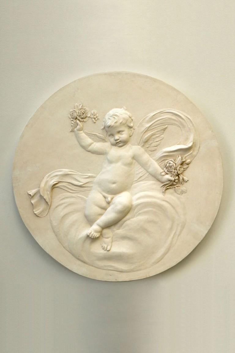 Coade Studio decorative plaster roundel, modelled in delicate low relief. The four seasons roundels are influenced by the 18th century Coade designs.

This is the plaster version of our Four Seasons roundel, for indoor use only.

Autumn - cherub