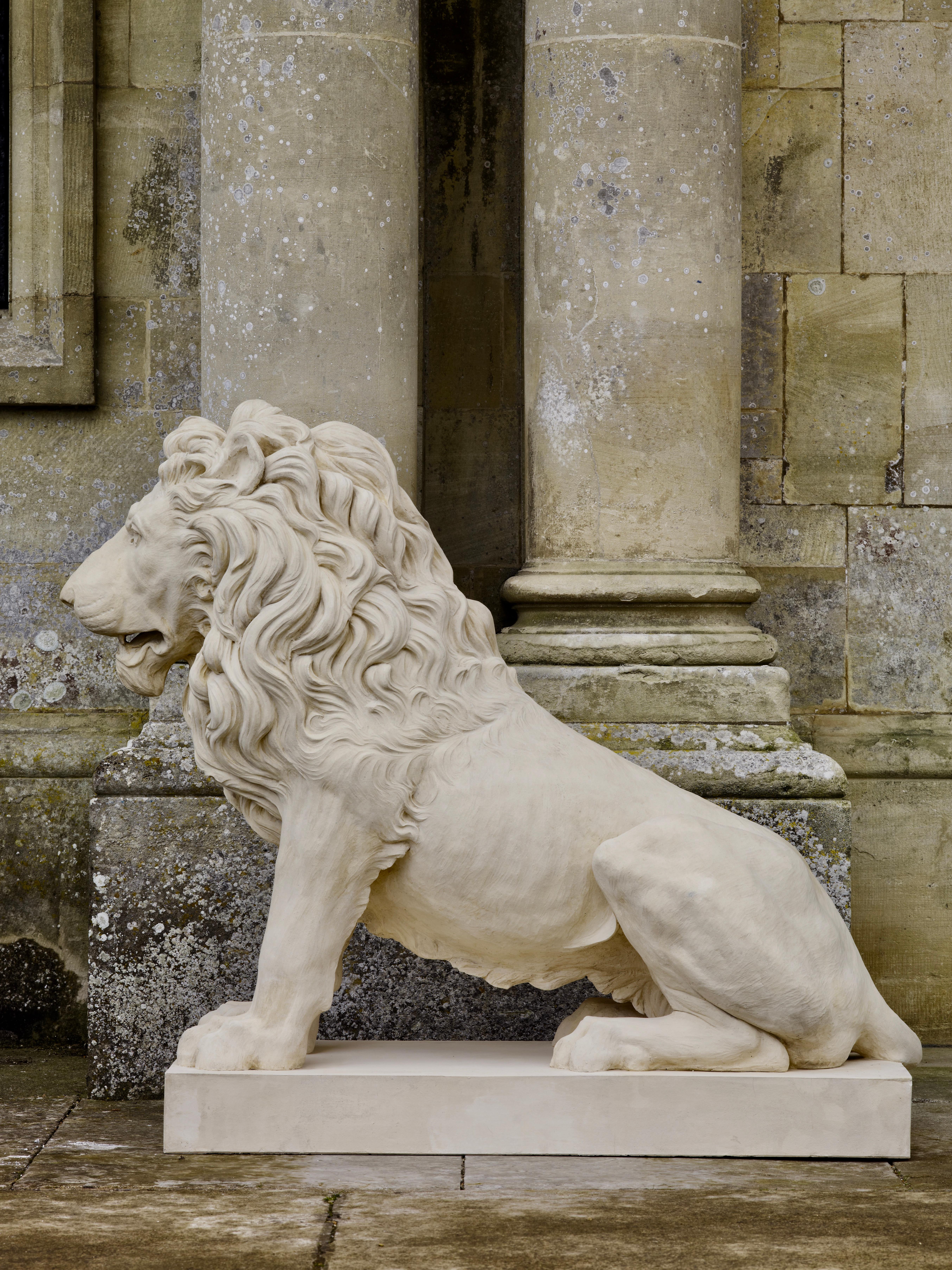 One of a selection of lions we make at Coade Studio.

This Coade Stone lion sejant, is one of a handed pair commissioned by an investment bank in Frankfurt, Germany to replace a missing pair. We were given antique photos of an indistinct nature to