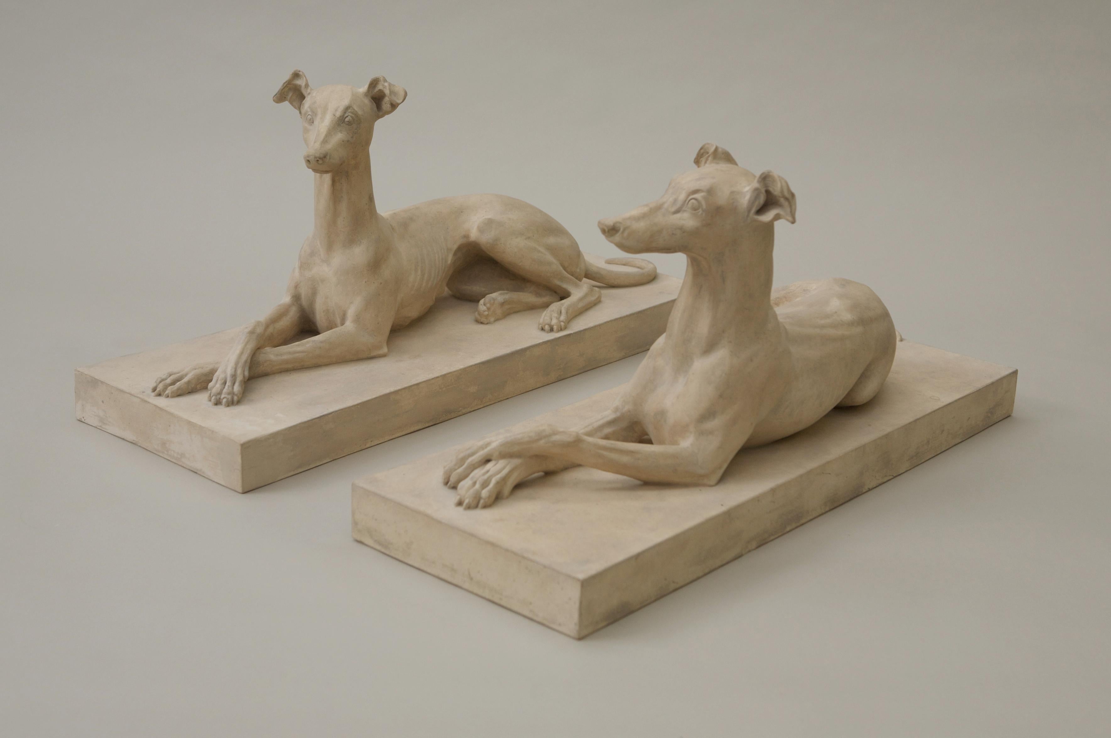 The recumbent hounds, whippets on rectangular plinths. The pair is male & female handed.

Also available individually. 
One whippet is £3,900 + VAT


