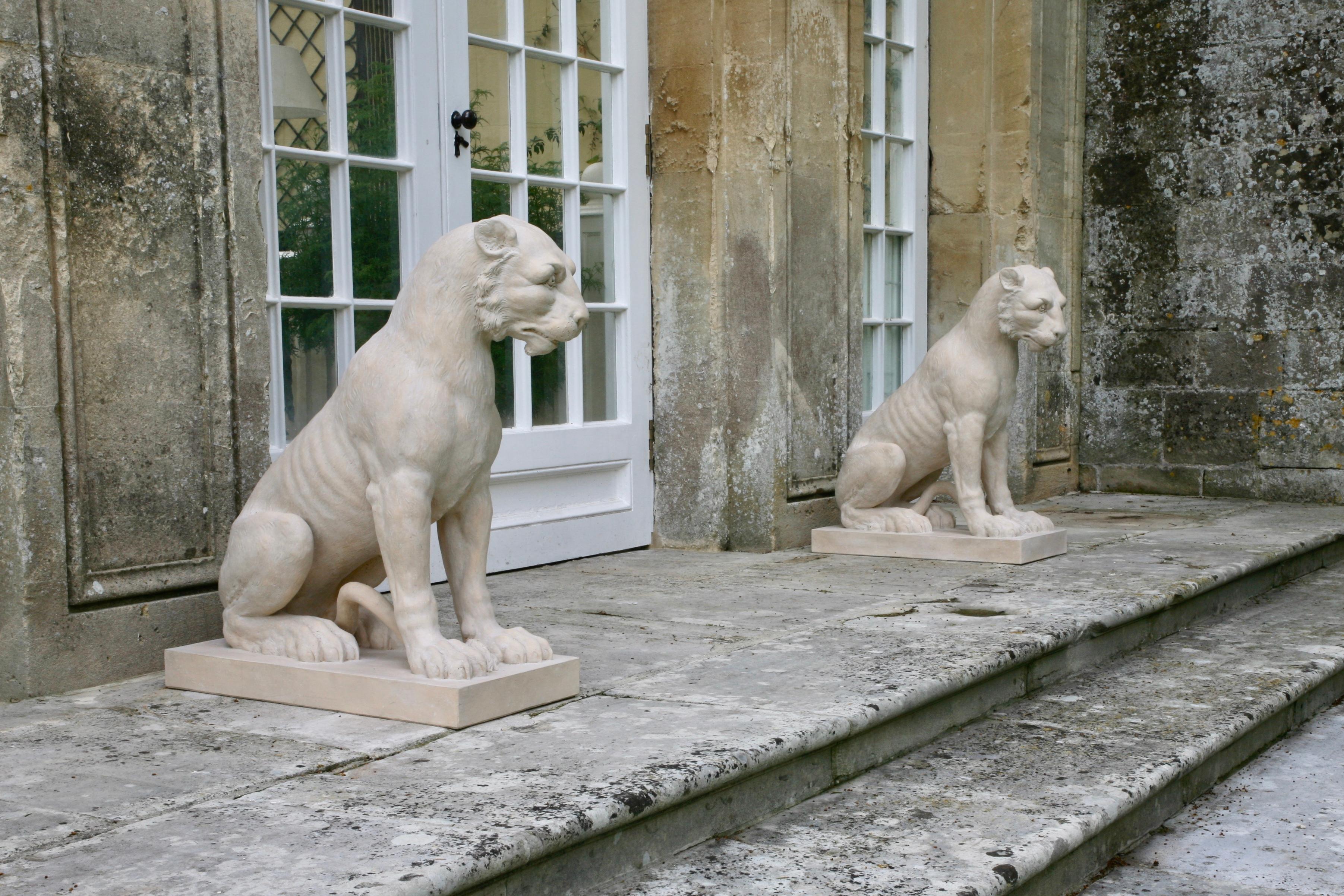 Tiger or possibly a lioness, modelled after an 18th century original by 'Coade' Manufactory.

Shown seated, looking to sinster, on a modern rectangular base.

In Chinese mythology, the tiger represents the greatest of earthly power and protection