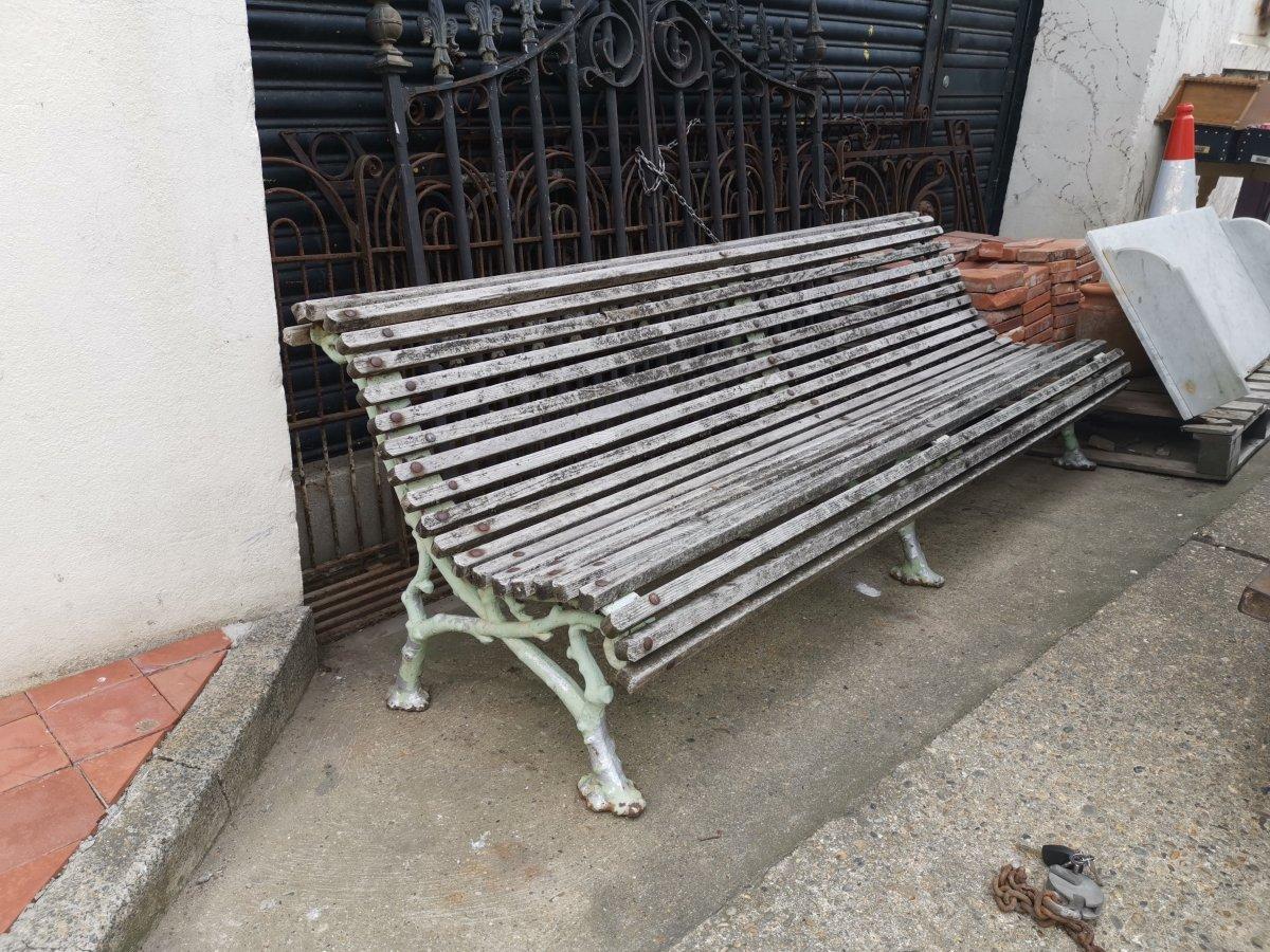 Coalbrookdale.
A cast iron Victorian garden bench, in the style of organic naturistic branches designed to perfectly blend into a garden setting, with a slatted seat.
