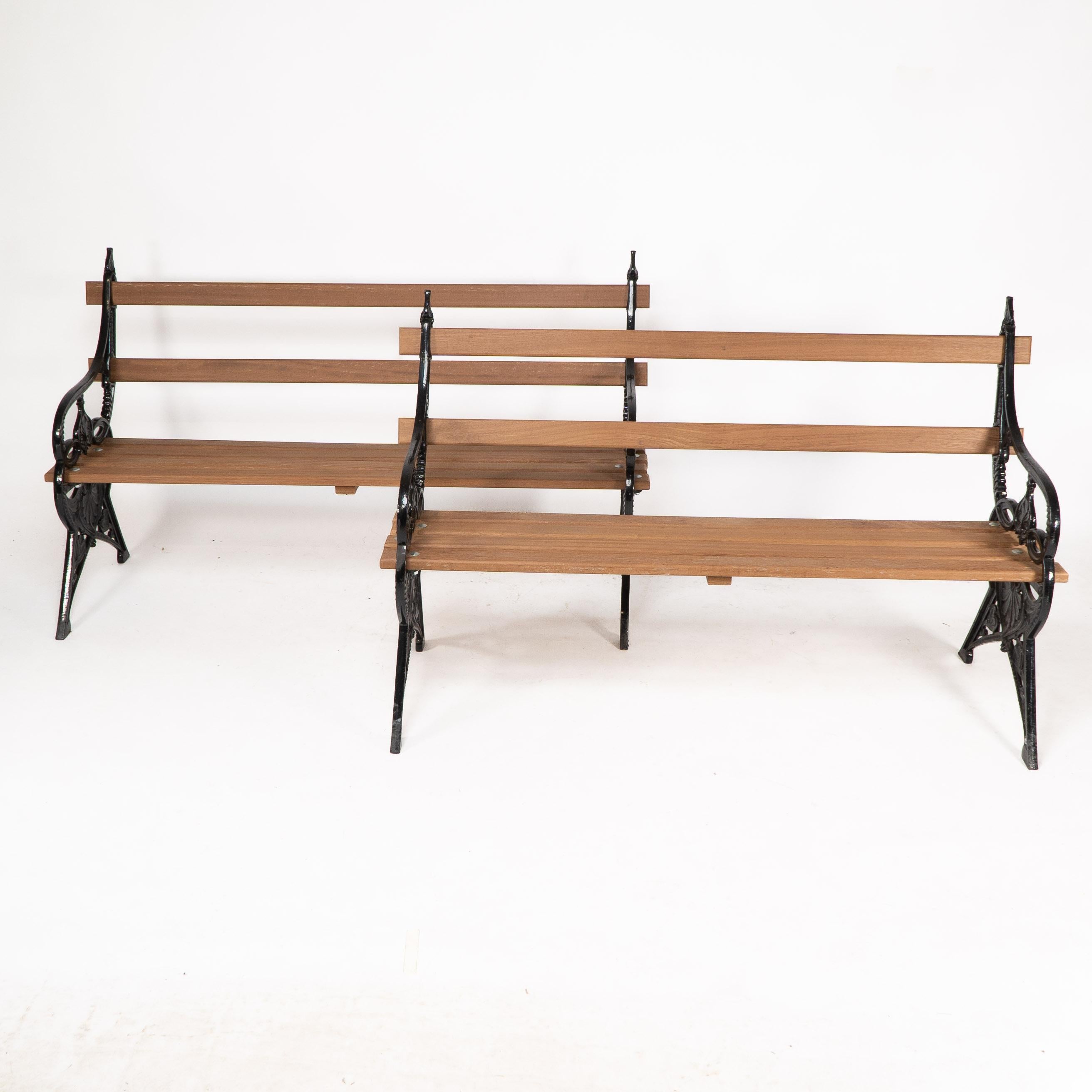 A pair of Aesthetic Movement cast iron garden benches, known as the Lily pad design, with fine fern leaf detailing, and smaller Lily-style leaves to the angular legs.Price per benchCoalbrookdale Iron Works and Foundry, Shropshire England, was one of