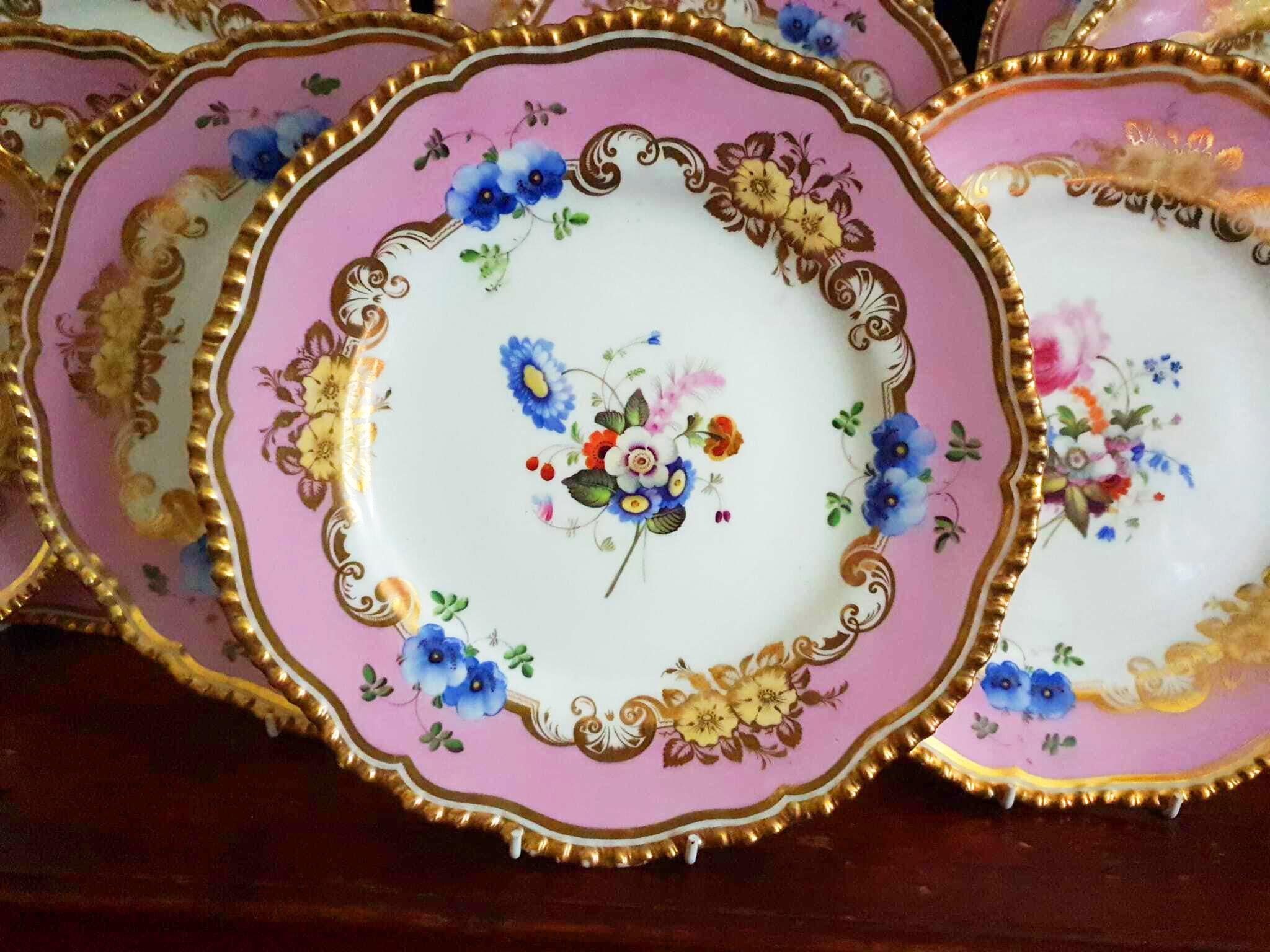 A Coalport set of 8 absolutely gorgeous pink dessert plates all hand painted pieces attributed to Steven Lawrence, one of the best painters from the Coalport factory. These plates are In excellent condition and dates, circa 1820s.
Each plate is