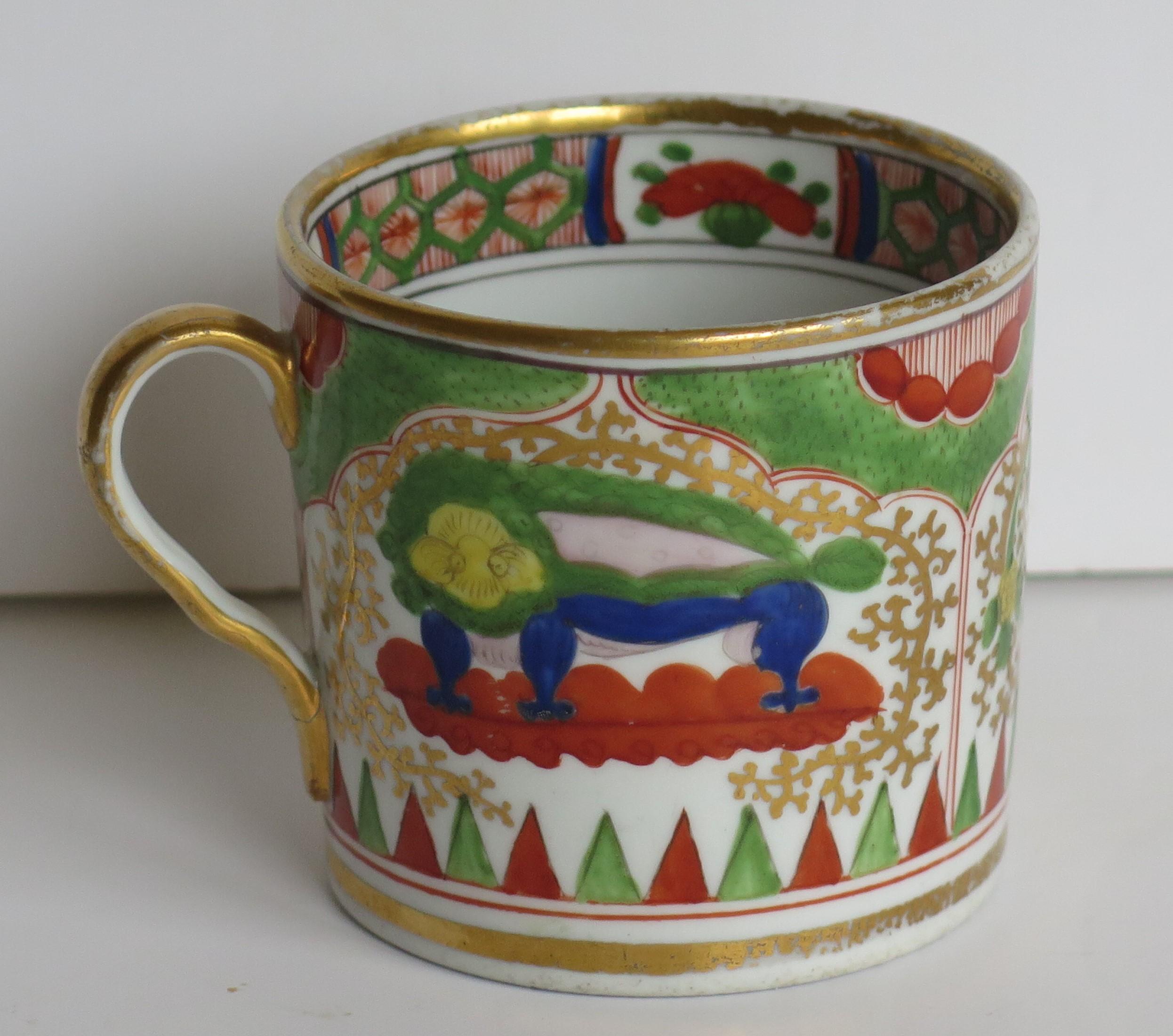 This is a good quality coffee can that we attribute to the Coalport porcelain works, Shropshire, England, made during the John Rose period of the George 111rd years, circa 1805-1810.

The coffee can is nominally parallel, tapering slightly to the