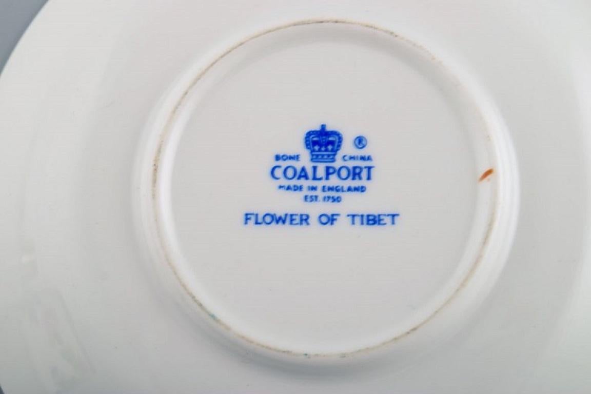 Coalport, England. Seven Flower of Tibet chocolate cups with saucers. In Excellent Condition For Sale In Copenhagen, DK