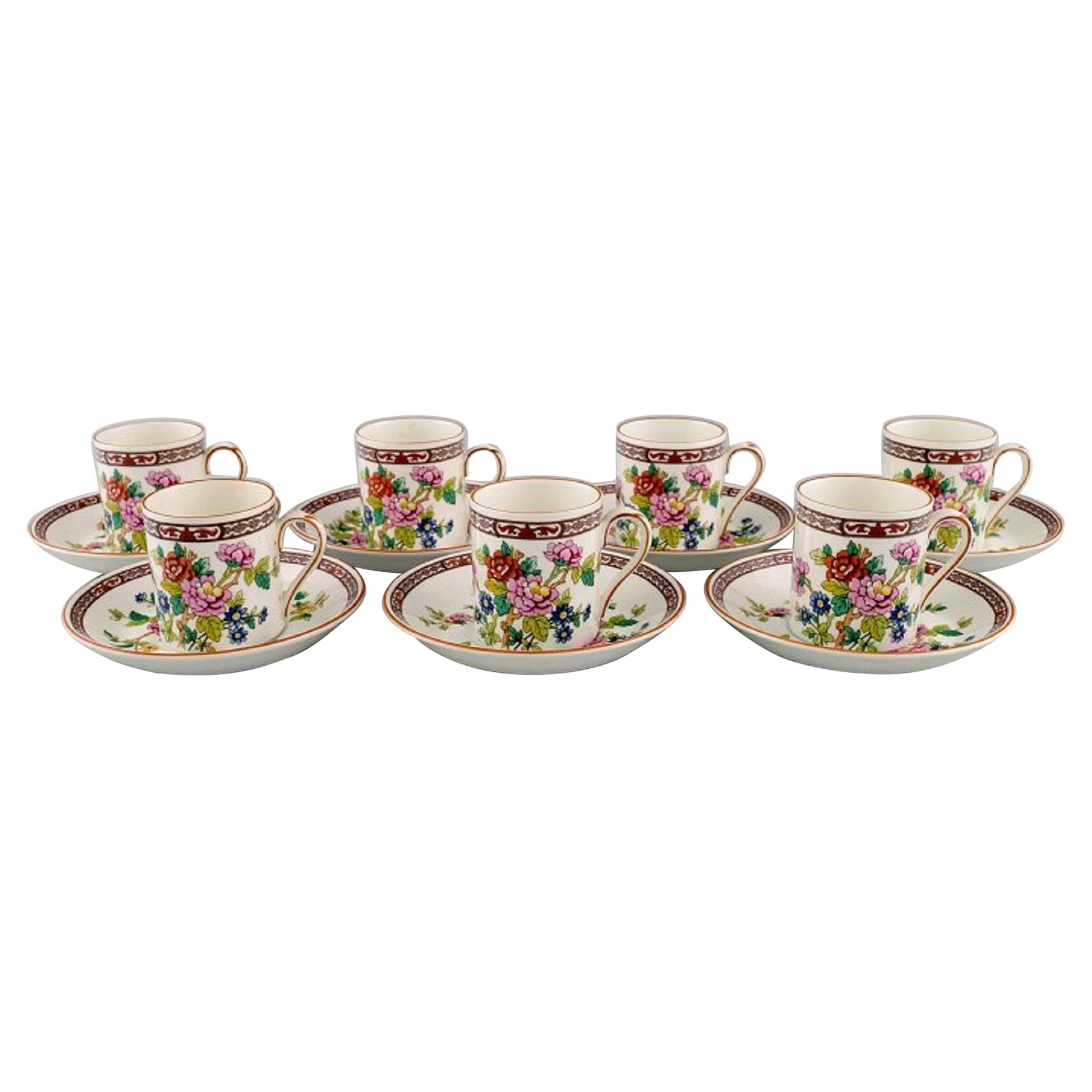 Coalport, Inghilterra. Sette tazze di cioccolato Flower of Tibet con piattini. in vendita