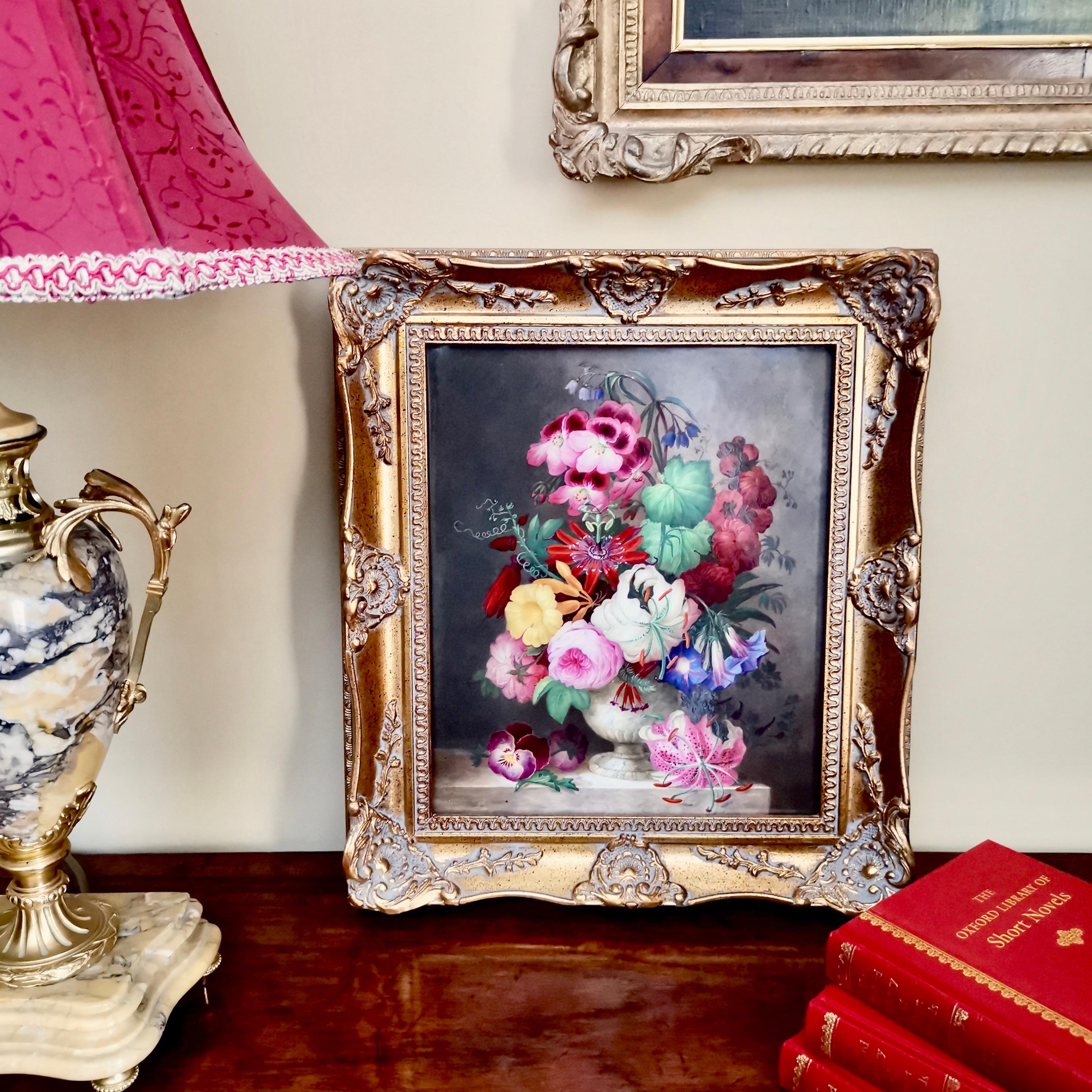 This is a rare and extremely beautiful porcelain plaque in a gilt frame, made by Coalport in circa 1840. The image is of lavish flower bouquet in the Victorian style.

Coalport was one of the leading potters in 19th and 20th century Staffordshire.
