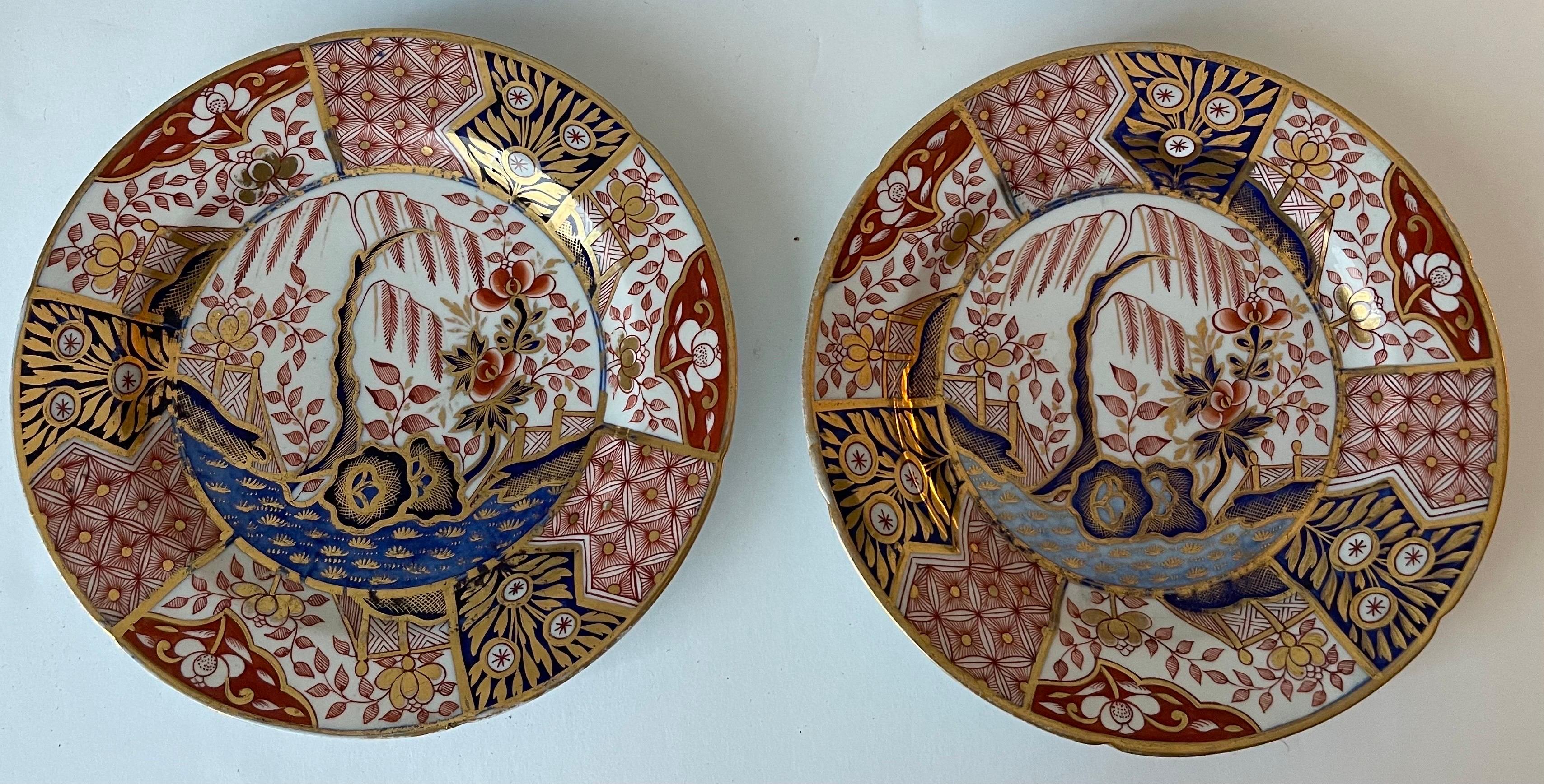 Set of four antique Coalport money tree pattern cabinet plates or dessert plates. Hand painted, richly detailed design. 
Each plate measures 8.25” diameter. 