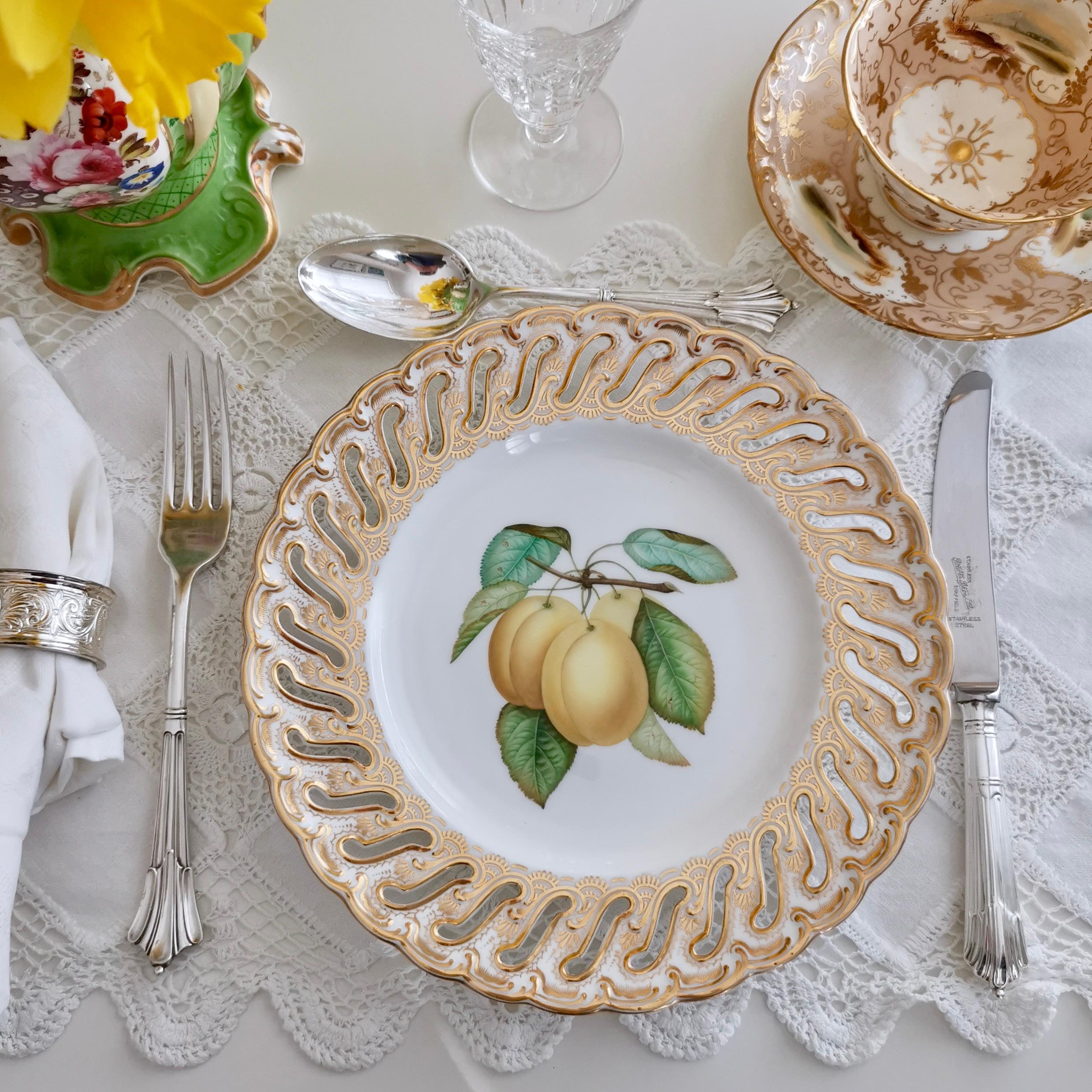 This is a stunning dessert plate made by Coalport in about 1848. The plate has a spectacularly pierced rim and beautiful yellow plums painted by the famous painter Joseph Birbeck.

Coalport was one of the leading potters in 19th and 20th Century