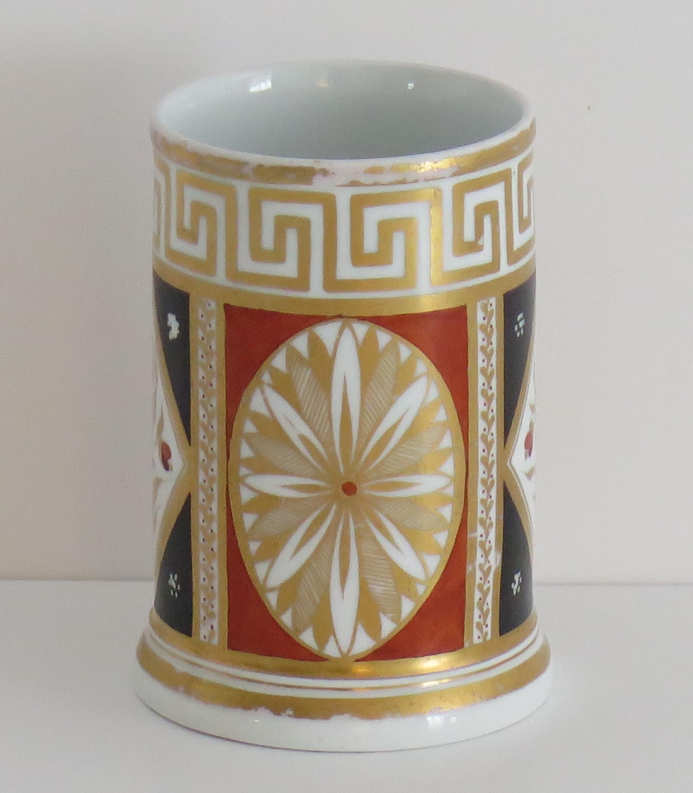 This is a good quality porcelain Spill vase which we attribute to Coalport, England, circa 1810.

The vase is well potted with a very white glaze 

It is well hand decorated with four alternating vertical panels in pattern number 90, with a