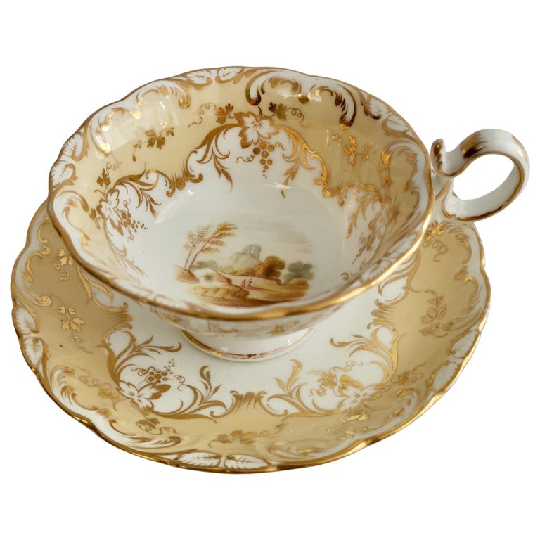 Coalport Porcelain Teacup, Beige with Landscapes, Rococo Revival, ca 1840 For Sale