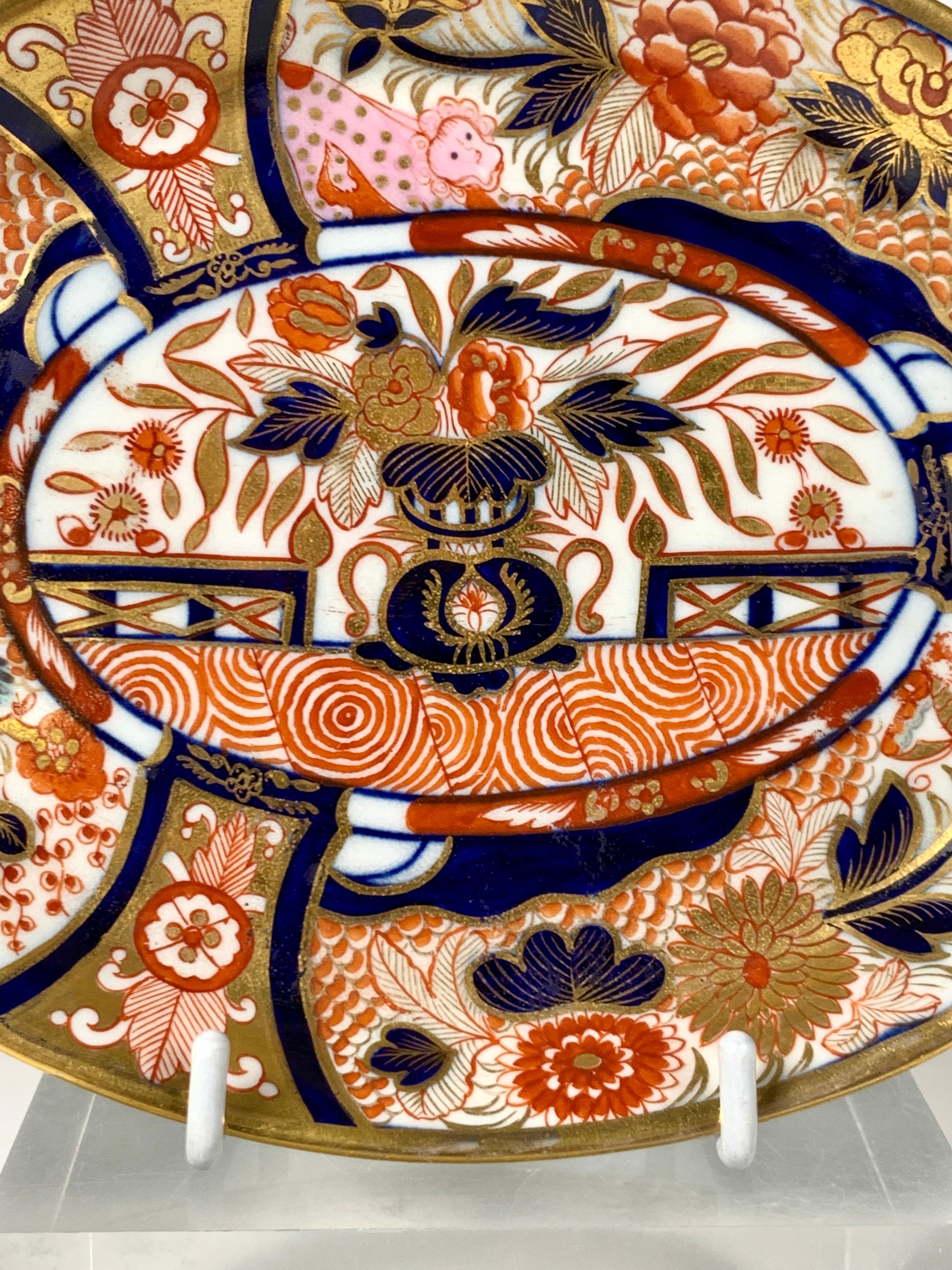 Why we love it: The intensity of the Imari colors and the fabulous pink spotted lion. 
This Coalport Admiral Nelson oval dish was hand-painted in England during the Regency period circa 1810. It is decorated in a traditional, vibrant Imari palette:
