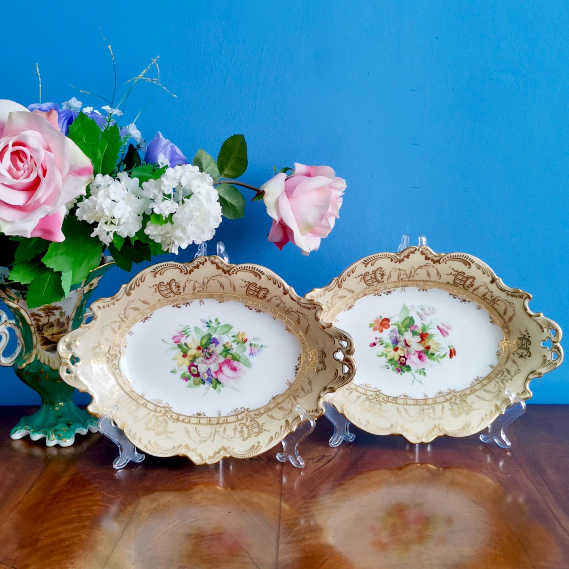 This is a set of two beautiful oval dessert serving dishes made by Coalport in about 1847 and painted by the famous porcelain painter Thomas Dixon. These dishes would have belonged to a large dessert service. I have several other dessert items from