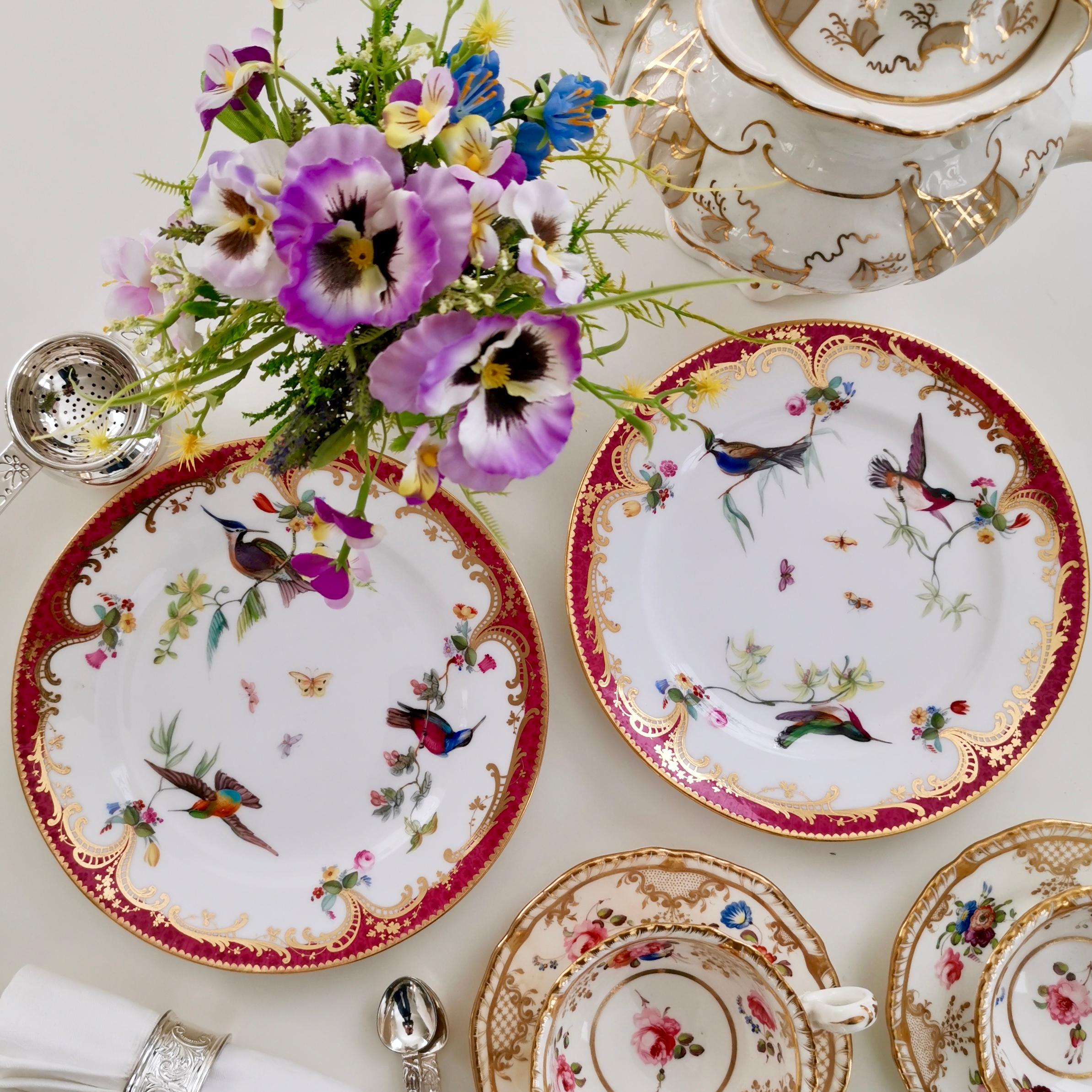 This is a set of 2 small plates made by Coalport in circa 1865. The plates are hand painted with beautiful humming birds and butterflies by the famous porcelain artist John Randall.

I am also able to get two plates from the same set with parrots,