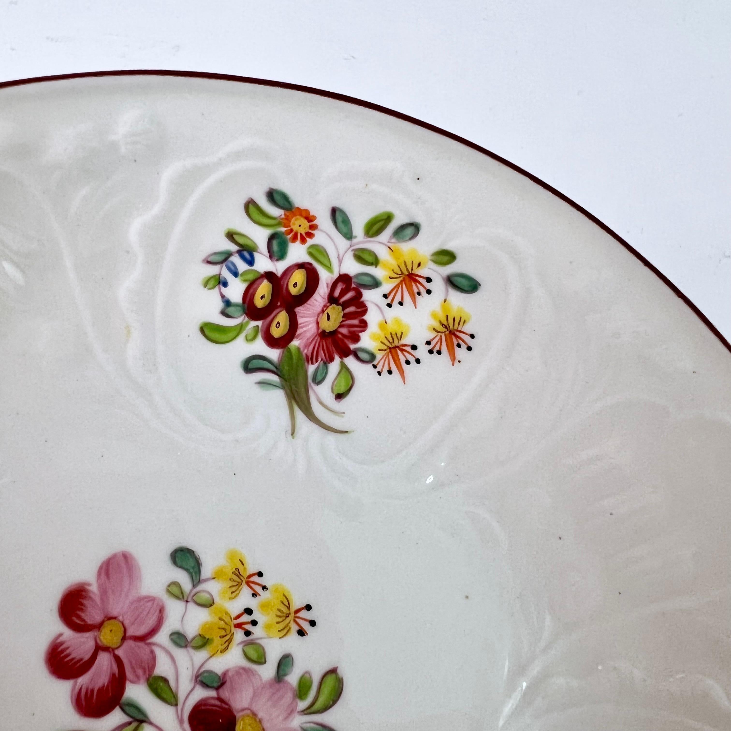Porcelaine Cuillère à thé de Coalport, motif floral blanc suspendu à l'aveugle, vers 1817 en vente