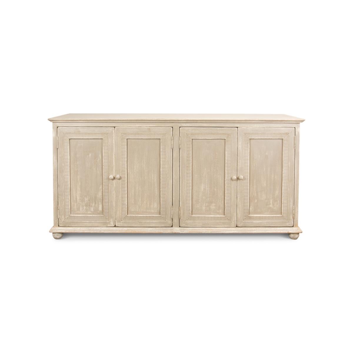 Made of pine with an antiqued and distressed hand-painted finish in a coastal beach beige color. With four doors framed in a classic American pie crust detail.

Dimensions: 76