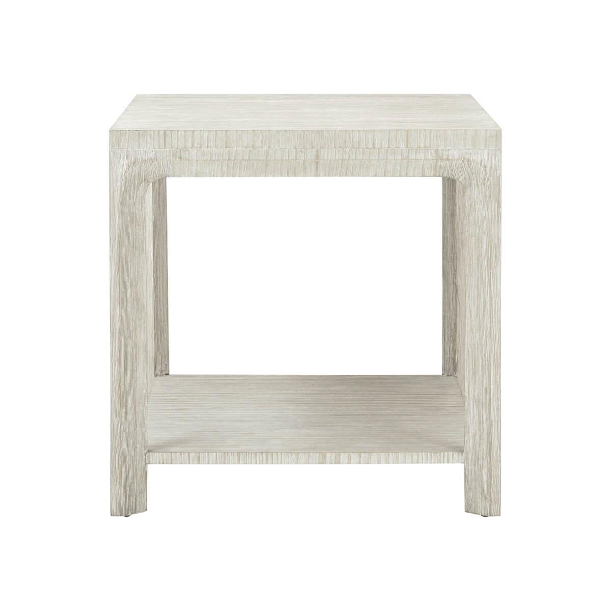 A four-legged wire-brushed cerused pine side table is supported by a bevel-shaped cross section and seen here in our Sea Salt finish.

Dimensions: 24