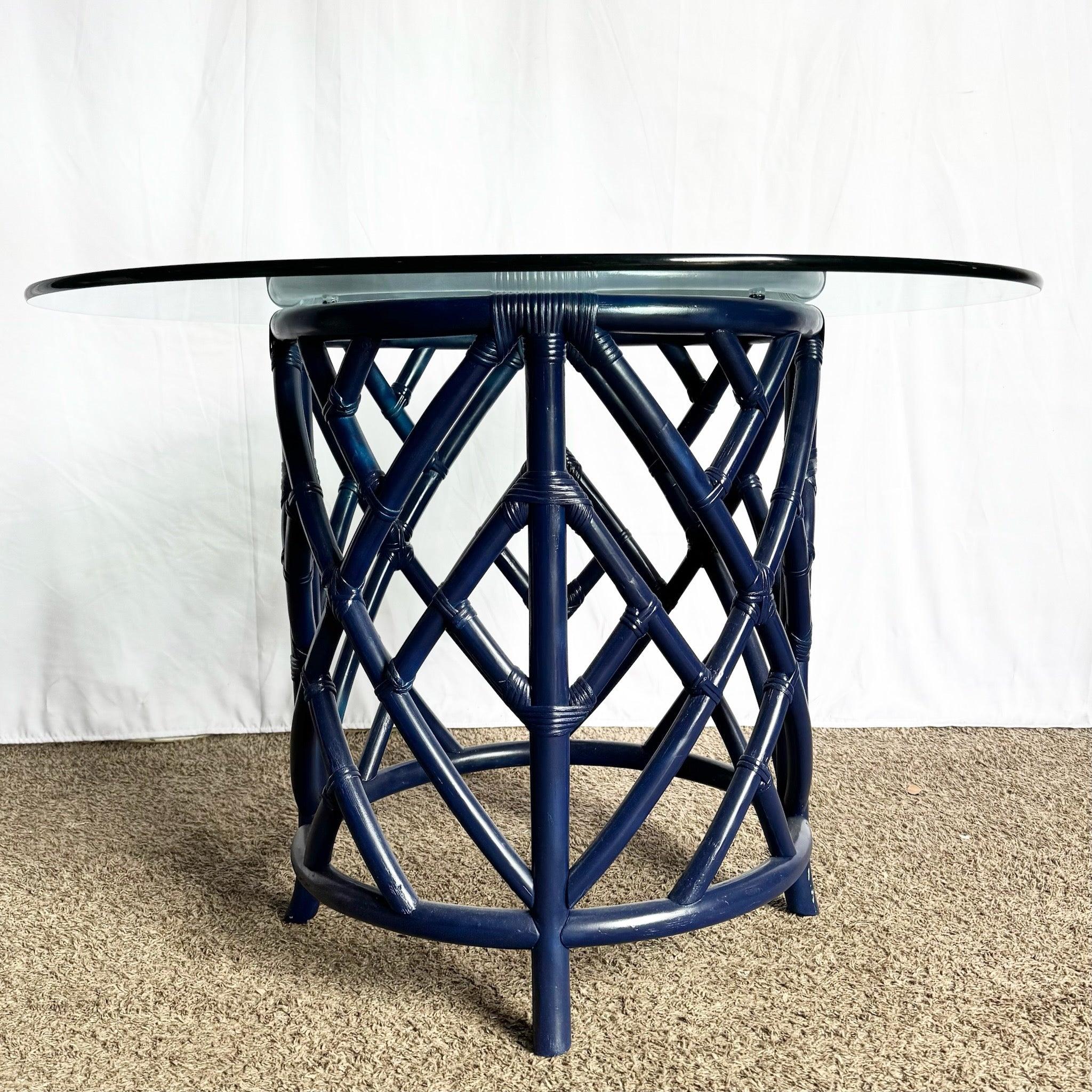 Coastal Navy Chippendale Glass Table with navy rattan lattice base and round glass top—sculptural, elegant centerpiece for coastal boho interiors.
 

 Some wear to the paint as shown in the photos. 
 

 We sell items as acquired, without restoring