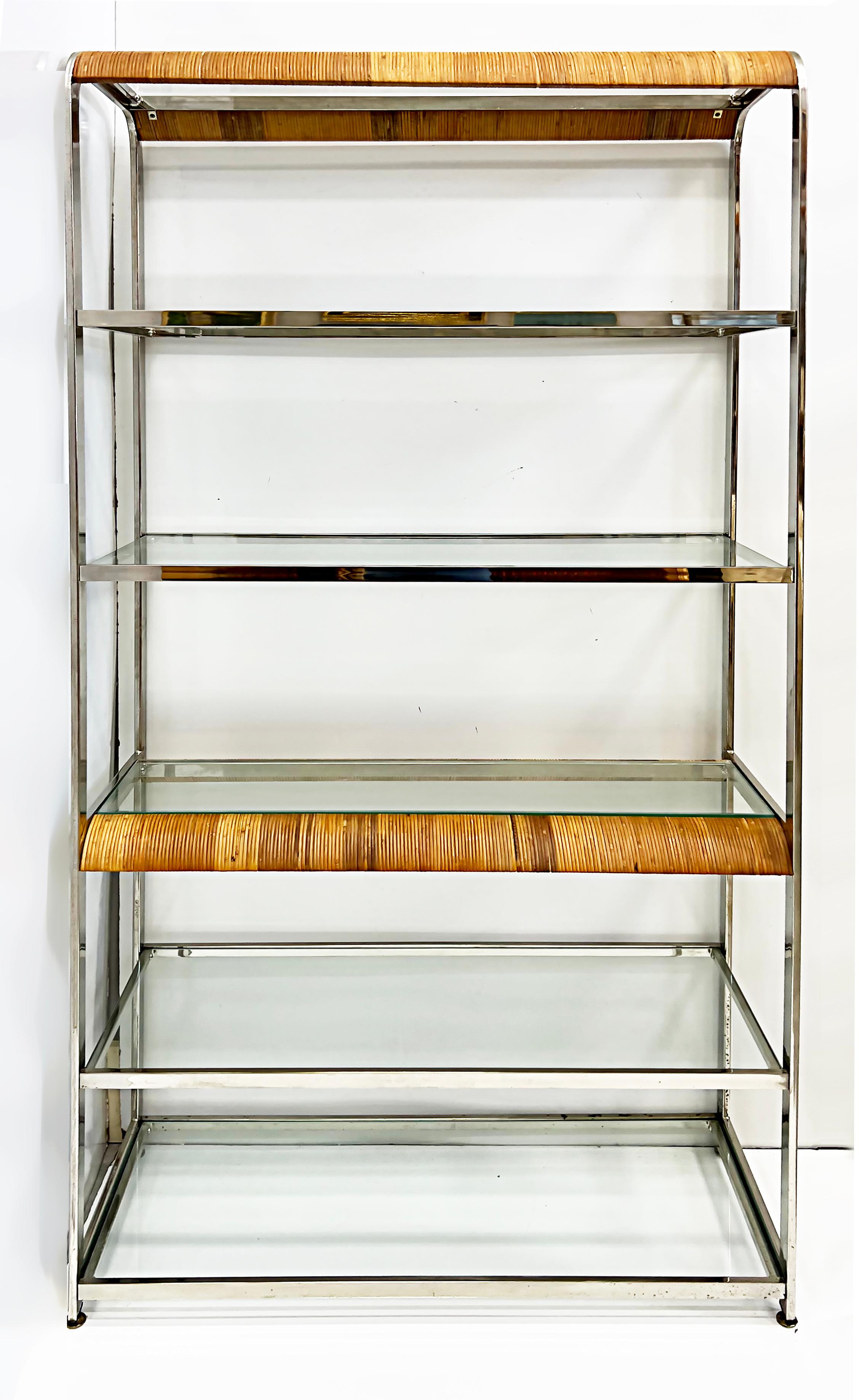 Coastal Chrome, Split Rattan Reed Etageres with glass shelves, pair.

Offered for sale is a pair of Coastal chrome and wrapped split rattan reed etageres with glass shelves. The chrome is very reflective and the design is clean but has a softer