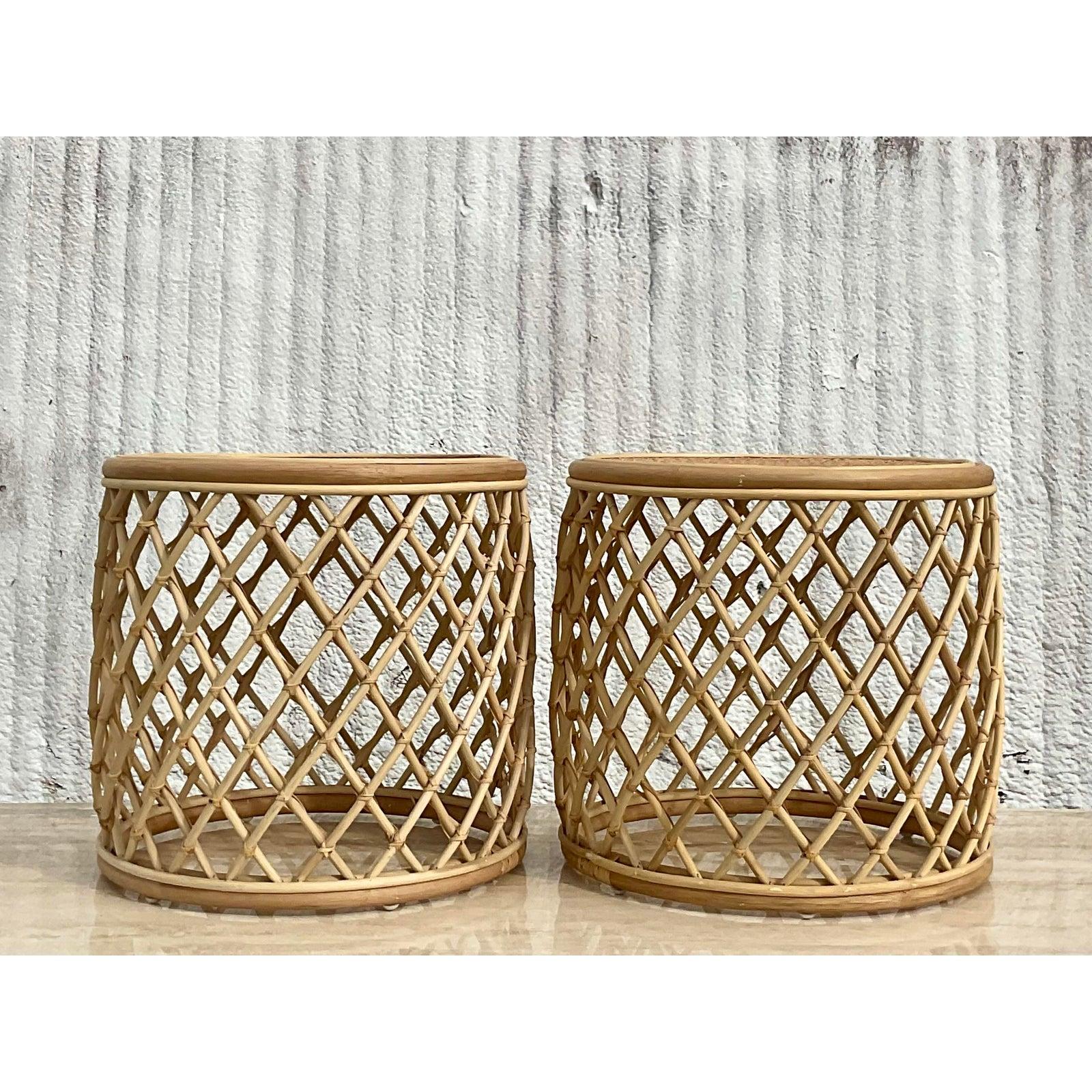 Coastal woven rattan side tables. A fab pair of cross hatched drum shape tables perfect for side tables or little drinks tables. Super versatile. Perfect for indoors or outdoors in a covered area. Acquired from a Palm Beach estate.