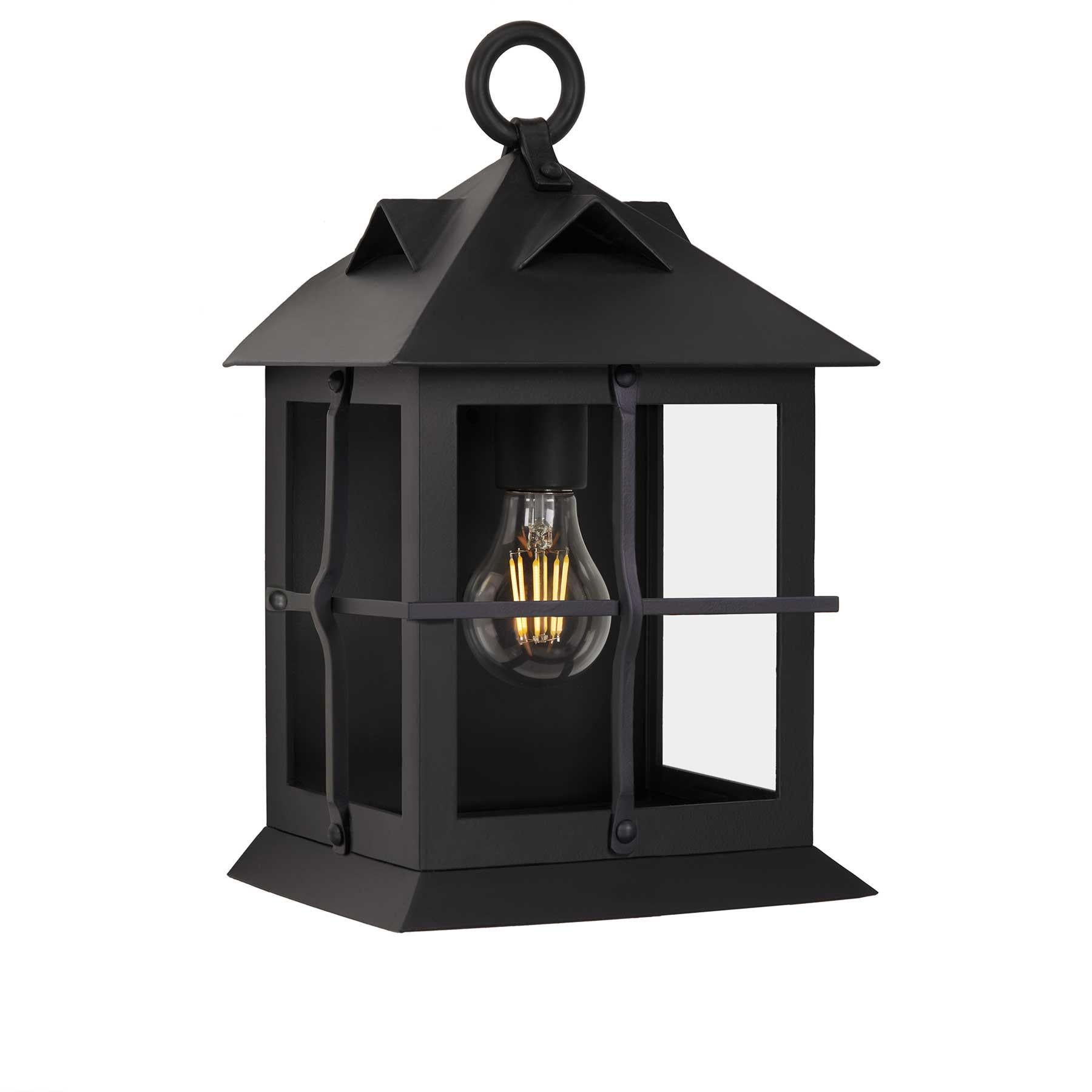 This lantern's balanced proportions perfectly blend the Spanish Colonial Revival and Craftsman movements, both popular in the early 1900s. Simple yet elegant, this lantern embodies the sturdy structuring of the Craftsman cottage, mimicking the