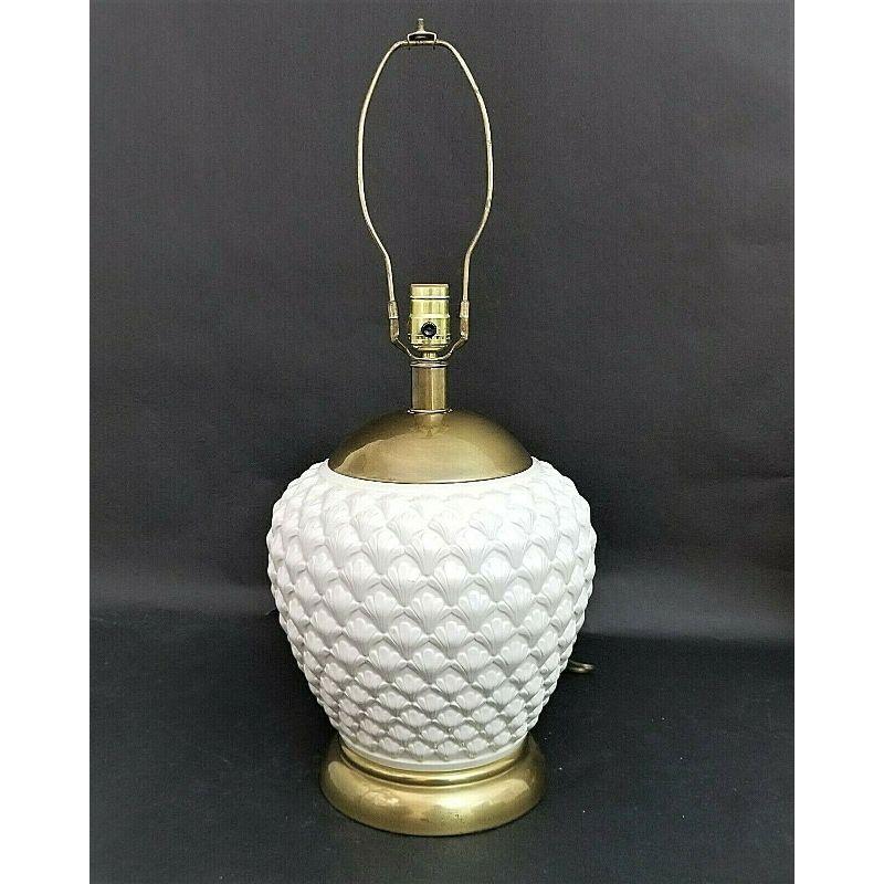 
Offering One Of Our Recent Palm Beach Estate Fine Lighting Acquisitions Of A
Palm Beach coastal Frederick Cooper 1970s ceramic and brass Bee Hive Sea Shell Lamp.

Coloration: Ivory

Measurements
26