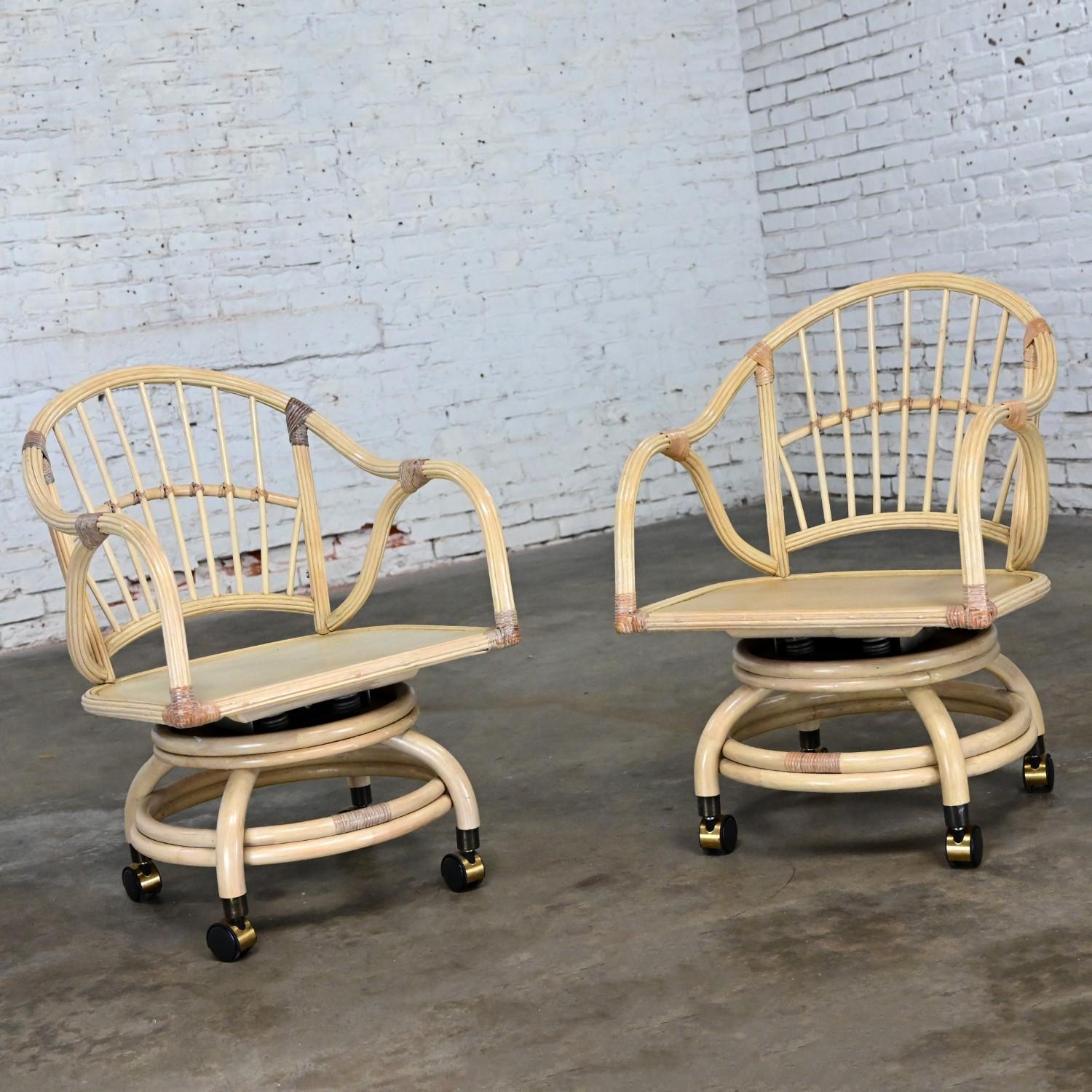 Coastal Island Style Cerused Reeded Rattan Rolling & Swivel Chairs a Pair In Good Condition For Sale In Topeka, KS